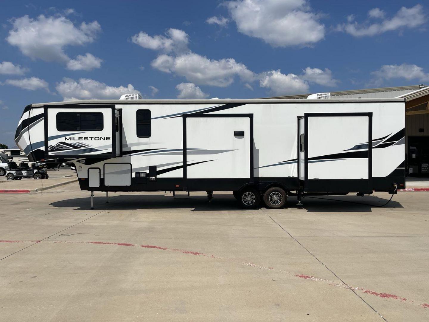 2021 HEARTLAND MILESTONE 379FLML (5SFMG4426ME) , Length: 44.17 ft. | Dry Weight: 12,600 lbs. | Gross Weight: 15,000 lbs. | Slides: 5 transmission, located at 4319 N Main Street, Cleburne, TX, 76033, (817) 221-0660, 32.435829, -97.384178 - The 2021 Heartland Milestone 379FLML is 44.17 feet in length and has a dry weight of 12,600 pounds, with a gross weight capability of 15,000 pounds. This type of RV is intended for extended living and luxurious travel. It comes with five slide-outs that dramatically increase interior space, creating - Photo#24