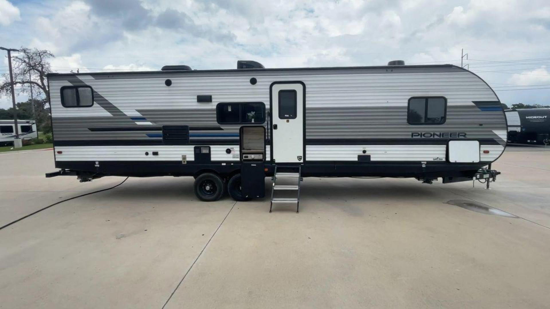 2021 WHITE HEARTLAND PIONEER BH322 (5SFPB3721ME) , Length: 36.92 ft. | Dry Weight: 7,436 lbs. | Gross Weight: 9,000 lbs. | Slides: 1 transmission, located at 4319 N Main Street, Cleburne, TX, 76033, (817) 221-0660, 32.435829, -97.384178 - This 2021 Heartland Pioneer BH322 travel trailer measures 36.92 ft in length, 8.04 ft in width, 11.33 ft in height, and 6.67 ft interior height. This unit is easily towable with only 7,436 lbs dry weight with a payload capacity of 1,548 lbs. The unit has a GVWR of 9,000 lbs and a hitch weight of 788 - Photo#2