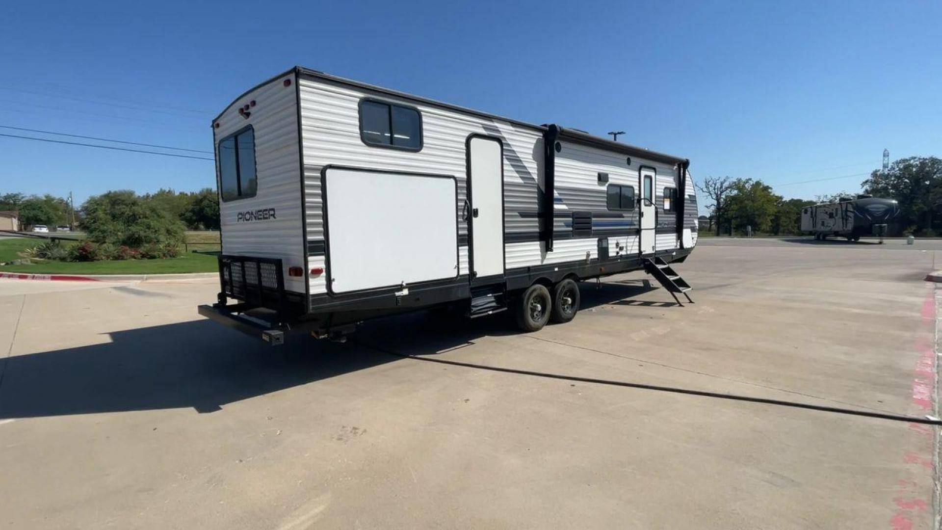 2021 HEARTLAND PIONEER DS320 (5SFPB3725ME) , Length: 37.42 ft. | Dry Weight: 7,696 lbs. | Gross Weight: 9,000 lbs. | Slides: 2 transmission, located at 4319 N Main Street, Cleburne, TX, 76033, (817) 221-0660, 32.435829, -97.384178 - The 2021 Heartland Pioneer DS320 is a spacious and well-designed travel trailer, perfect for large families or group trips. Measuring 37.42 feet in length with a dry weight of 7,696 lbs. and a gross weight of 9,000 lbs., this unit is built for comfortable travel while maintaining a manageable towing - Photo#1