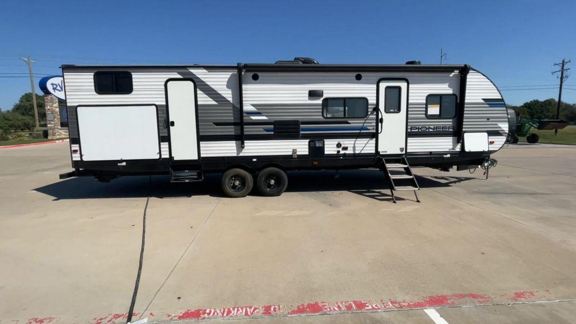 2021 HEARTLAND PIONEER DS320 (5SFPB3725ME) , Length: 37.42 ft. | Dry Weight: 7,696 lbs. | Gross Weight: 9,000 lbs. | Slides: 2 transmission, located at 4319 N Main Street, Cleburne, TX, 76033, (817) 221-0660, 32.435829, -97.384178 - The 2021 Heartland Pioneer DS320 is a spacious and well-designed travel trailer, perfect for large families or group trips. Measuring 37.42 feet in length with a dry weight of 7,696 lbs. and a gross weight of 9,000 lbs., this unit is built for comfortable travel while maintaining a manageable towing - Photo#2