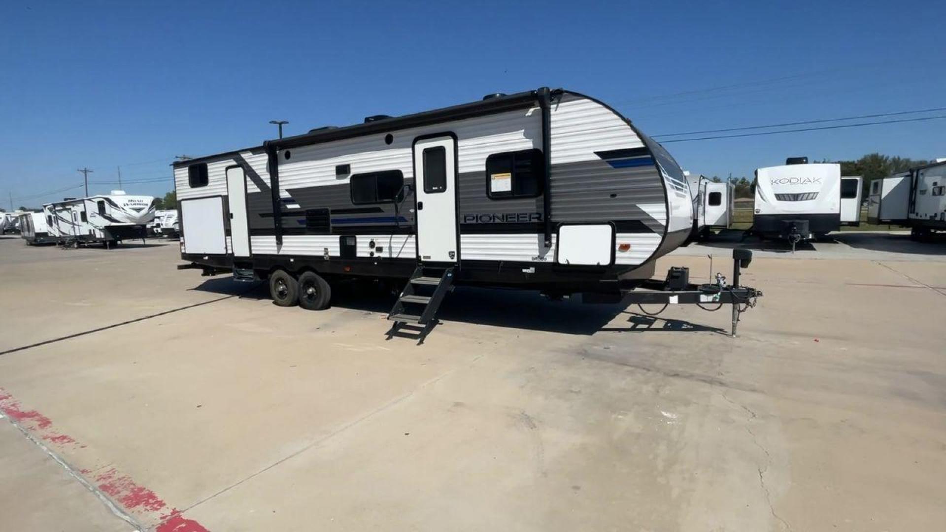 2021 HEARTLAND PIONEER DS320 (5SFPB3725ME) , Length: 37.42 ft. | Dry Weight: 7,696 lbs. | Gross Weight: 9,000 lbs. | Slides: 2 transmission, located at 4319 N Main Street, Cleburne, TX, 76033, (817) 221-0660, 32.435829, -97.384178 - The 2021 Heartland Pioneer DS320 is a spacious and well-designed travel trailer, perfect for large families or group trips. Measuring 37.42 feet in length with a dry weight of 7,696 lbs. and a gross weight of 9,000 lbs., this unit is built for comfortable travel while maintaining a manageable towing - Photo#3