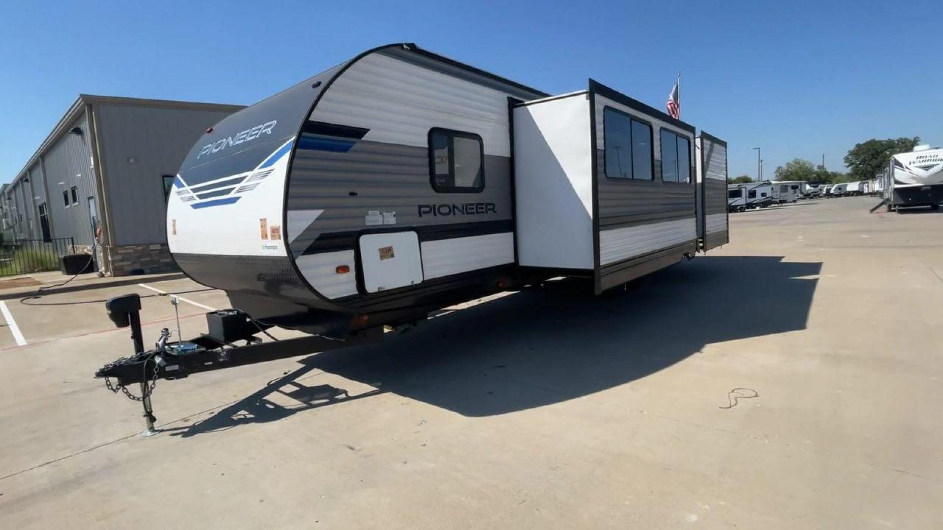 2021 HEARTLAND PIONEER DS320 (5SFPB3725ME) , Length: 37.42 ft. | Dry Weight: 7,696 lbs. | Gross Weight: 9,000 lbs. | Slides: 2 transmission, located at 4319 N Main Street, Cleburne, TX, 76033, (817) 221-0660, 32.435829, -97.384178 - The 2021 Heartland Pioneer DS320 is a spacious and well-designed travel trailer, perfect for large families or group trips. Measuring 37.42 feet in length with a dry weight of 7,696 lbs. and a gross weight of 9,000 lbs., this unit is built for comfortable travel while maintaining a manageable towing - Photo#5