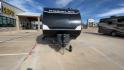 2021 HEARTLAND PROWLER 300BH (5SFPB3522ME) , Length: 33.92 ft. | Dry Weight: 6,785 lbs. | Gross Weight: 9,000 lbs. | Slides: 1 transmission, located at 4319 N Main Street, Cleburne, TX, 76033, (817) 221-0660, 32.435829, -97.384178 - The 2021 Heartland Prowler 300BH boasts a sleek and modern design. The front features a black, aerodynamic nose cap adorned with a bold Prowler logo and a subtle graphic of a prowling animal. The sidewalls are finished in a crisp white with contrasting black and blue accents that run the length of t - Photo#4