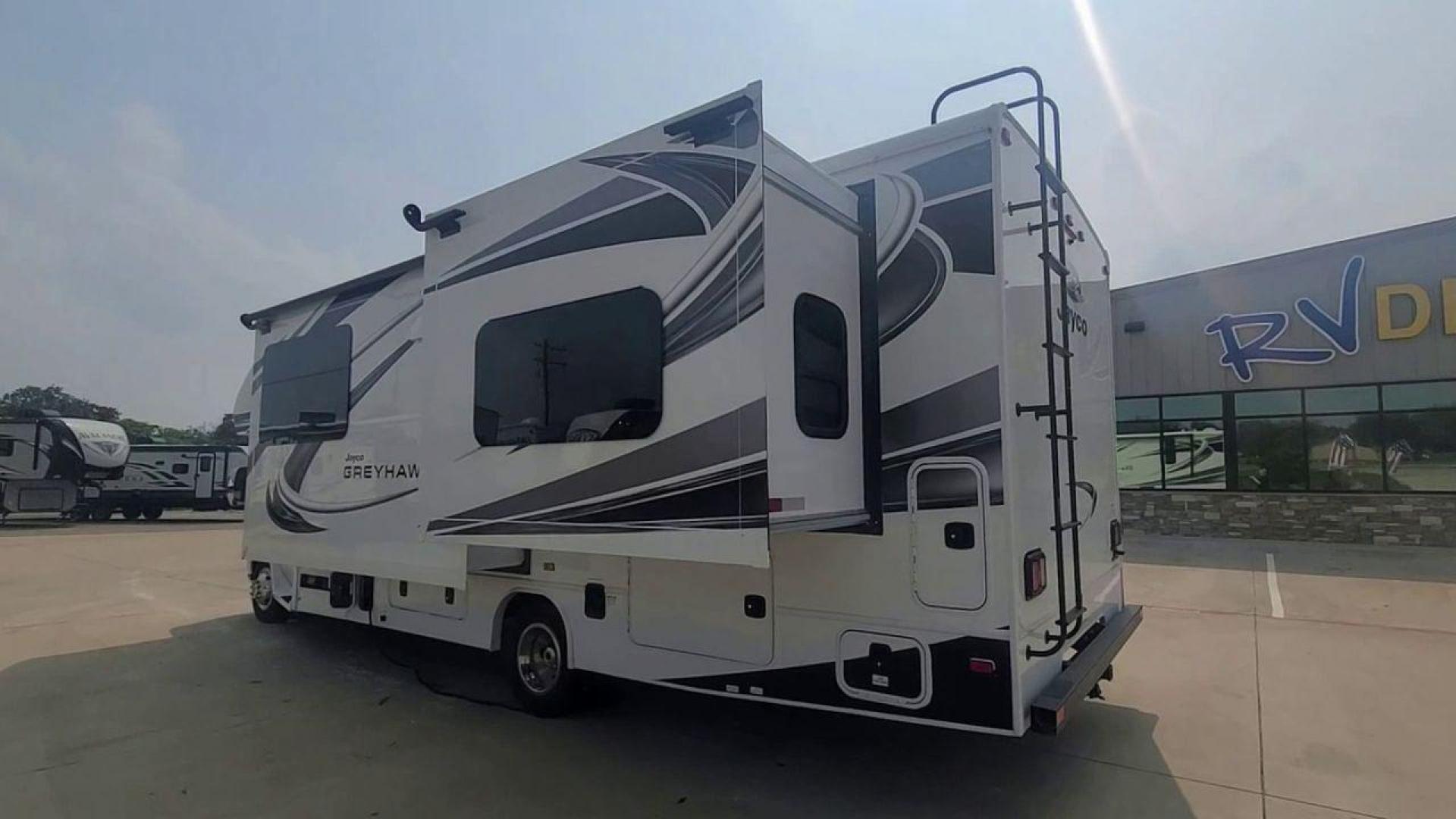 2021 WHITE JAYCO GREYHAWK 27U (1FDXE4FN7MD) , Length: 29.92 ft. | Gross Weight: 14,500 lbs. | Slides: 2 transmission, located at 4319 N Main Street, Cleburne, TX, 76033, (817) 221-0660, 32.435829, -97.384178 - The 2021 Jayco Greyhawk 27U is the best Class C motorhome on the market. It's great for people who want to go on adventures on the open road. The length of this RV is 29.92 feet, and its gross weight is 14,500 pounds. It is the perfect size for getting around. With two slides, the Greyhawk 27U's int - Photo#1