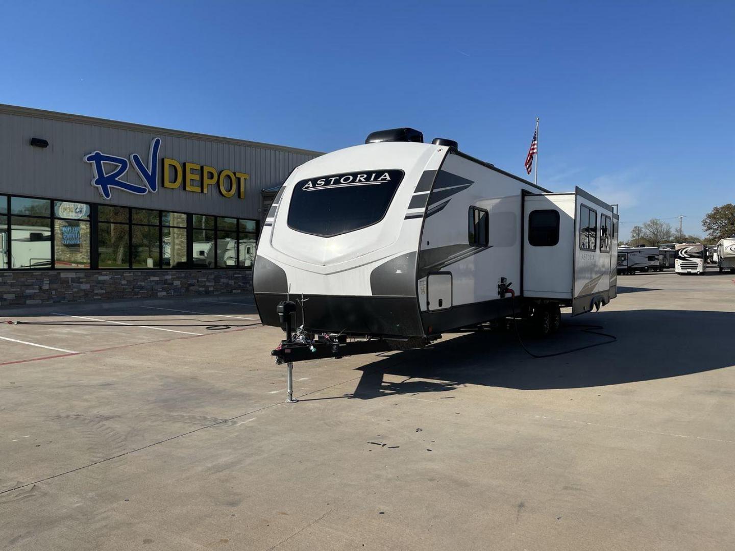 2021 KEYSTONE ASTORIA 3203BH (4YDT32020MM) , Length: 36.83 ft. ft | Dry Weight: 7,724 lbs. | Slides: 2 transmission, located at 4319 N Main Street, Cleburne, TX, 76033, (817) 221-0660, 32.435829, -97.384178 - With its elegant design, top-tier features, and durable construction, this 2021 Keystone Astoria 3203BH fifth wheel is poised to make every journey unforgettable. With a little over ~36 feet in length, the RV features a comfortable living area with theater-style seating facing the entertainment syst - Photo#0