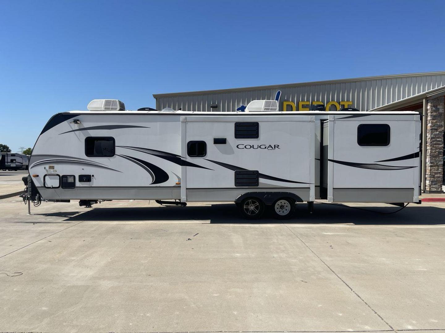 2021 KEYSTONE COUGAR 34TSB (4YDT34T26MV) , Length: 37.42 ft. | Dry Weight: 8,563 lbs. | Gross Weight: 10,500 lbs. | Slides: 3 transmission, located at 4319 N Main Street, Cleburne, TX, 76033, (817) 221-0660, 32.435829, -97.384178 - The 2021 Keystone Cougar 34TSB is a spacious and stylish travel trailer. With a total length of 37.42 feet and a dry weight of 8,563 lbs, it is both manageable for towing and expansive inside. Its sleek white exterior is accented with black and gray details, featuring bold Cougar branding on the fro - Photo#24