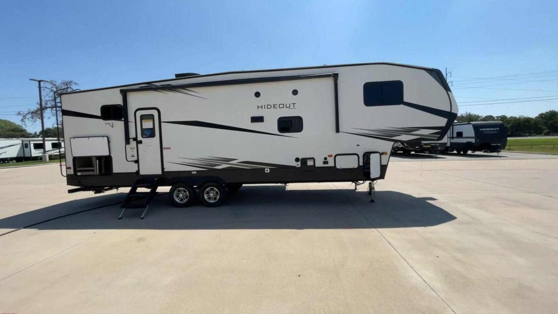 2021 KEYSTONE HIDEOUT 301DBS (4YDF30120M1) , Length: 34.17 ft. | Dry Weight: 8,669 lbs. | Gross Weight: 12,100 lbs. | Slides: 1 transmission, located at 4319 N Main Street, Cleburne, TX, 76033, (817) 221-0660, 32.435829, -97.384178 - Photo#2