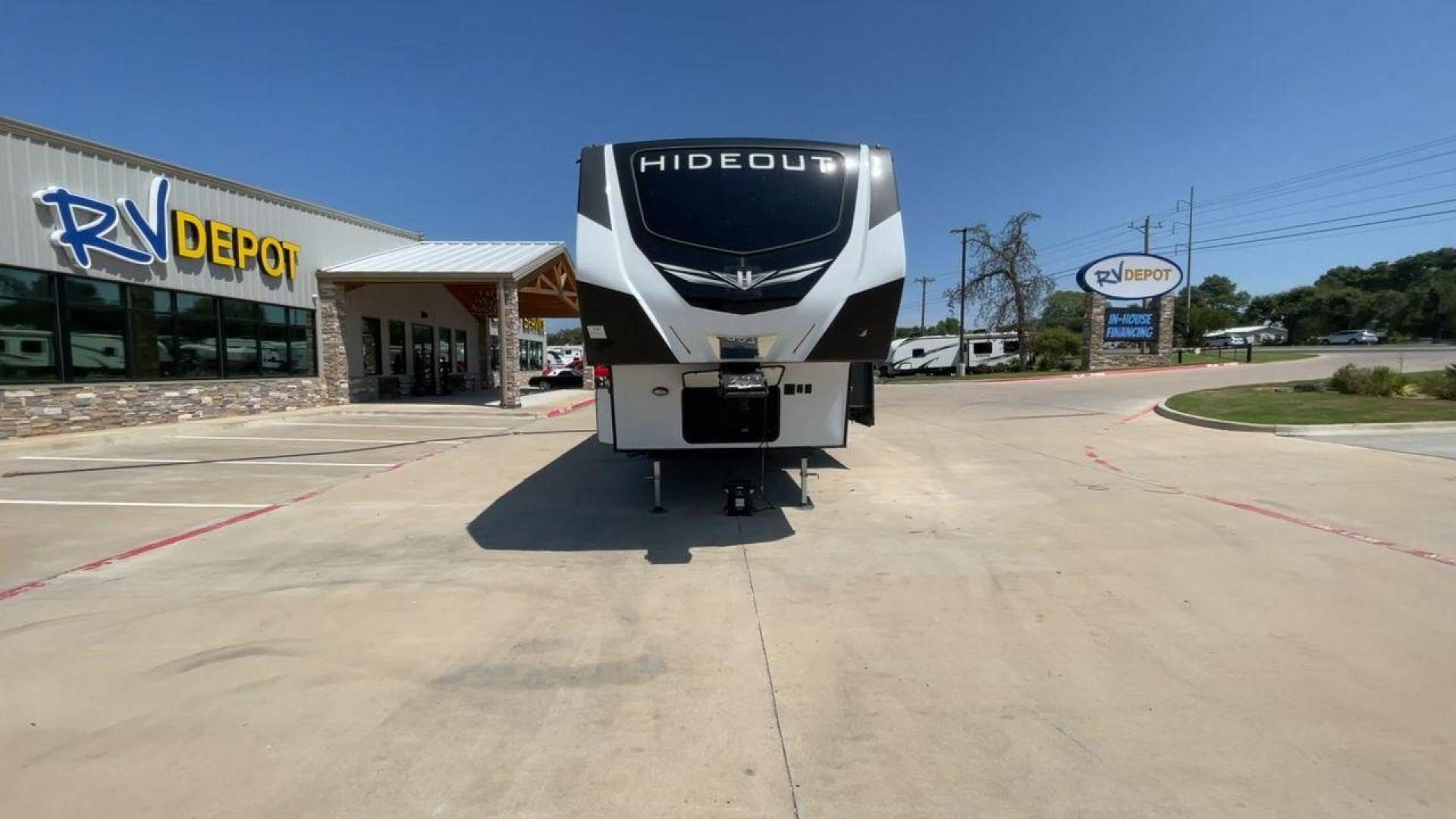 2021 KEYSTONE HIDEOUT 301DBS (4YDF30120M1) , Length: 34.17 ft. | Dry Weight: 8,669 lbs. | Gross Weight: 12,100 lbs. | Slides: 1 transmission, located at 4319 N Main Street, Cleburne, TX, 76033, (817) 221-0660, 32.435829, -97.384178 - Photo#4