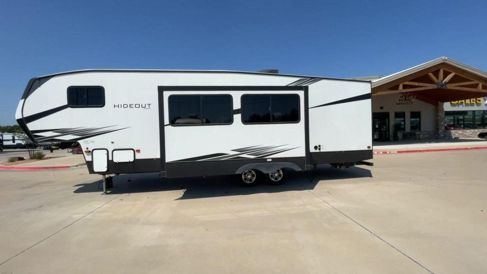 2021 KEYSTONE HIDEOUT 301DBS (4YDF30120M1) , Length: 34.17 ft. | Dry Weight: 8,669 lbs. | Gross Weight: 12,100 lbs. | Slides: 1 transmission, located at 4319 N Main Street, Cleburne, TX, 76033, (817) 221-0660, 32.435829, -97.384178 - Photo#6