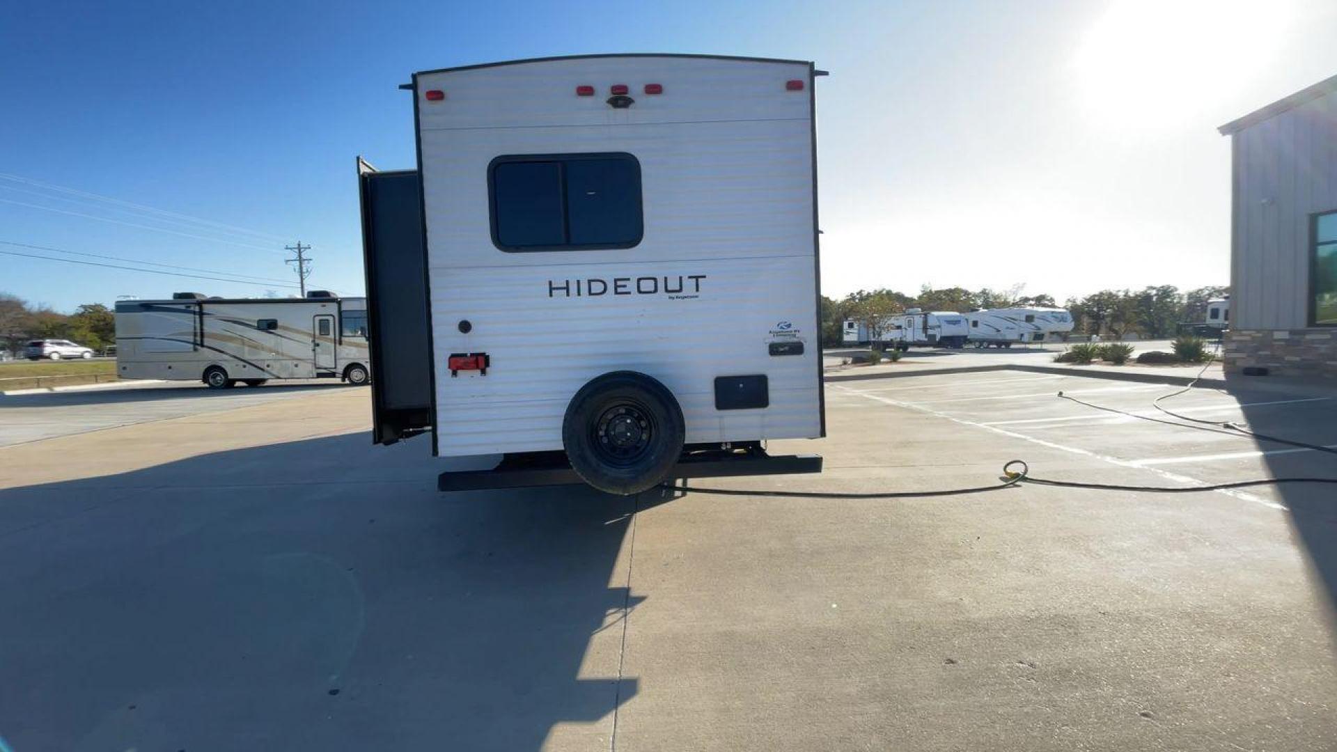 2021 KEYSTONE HIDEOUT 318BR (4YDT31824M7) , Length: 35.92 ft. | Dry Weight: 7,686 lbs. | Gross Weight: 9,700 lbs. | Slides: 2 transmission, located at 4319 N Main Street, Cleburne, TX, 76033, (817) 221-0660, 32.435829, -97.384178 - The 2021 Keystone Hideout 318BR is a spacious, family-friendly travel trailer designed to offer comfort and convenience on the road. With a length of 35.92 feet and a dry weight of 7,686 lbs, this model includes two slides that significantly expand the interior space. The exterior features a clean, - Photo#8