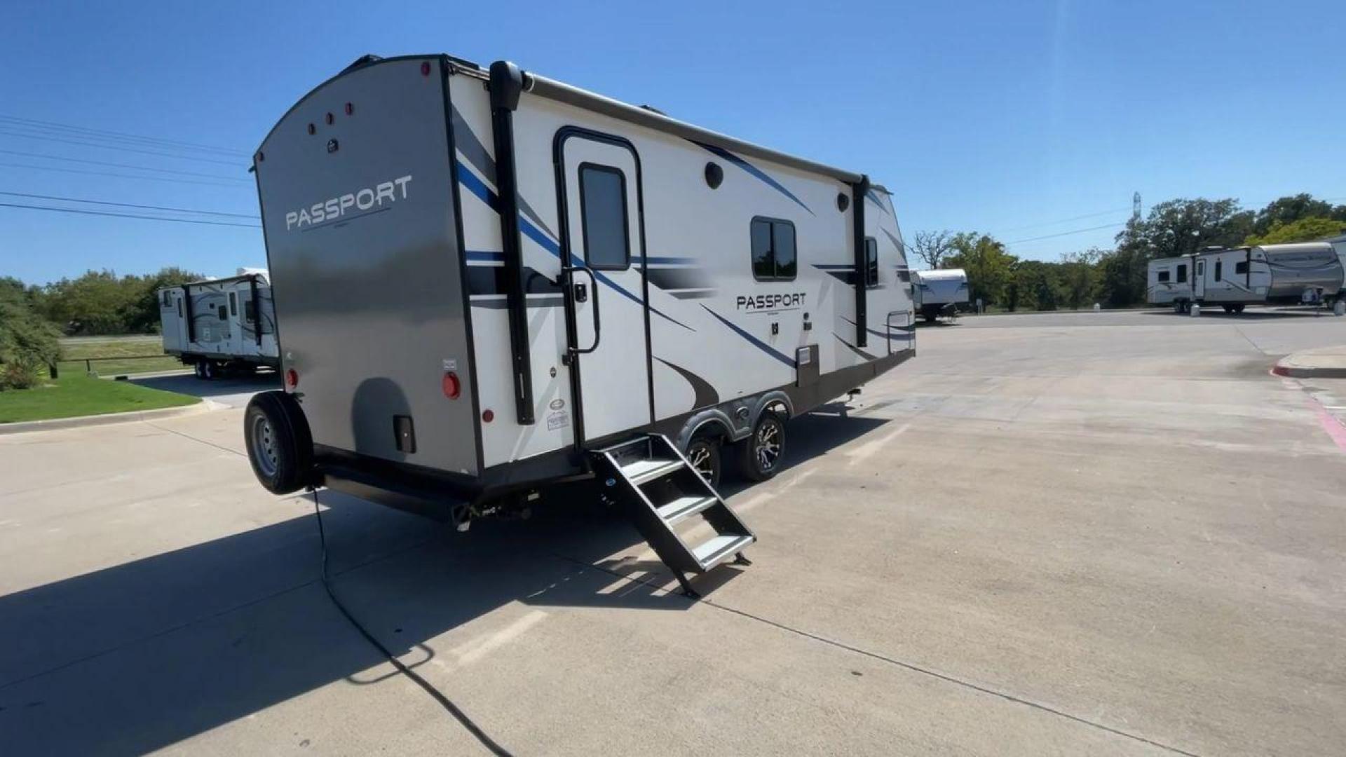 2021 KEYSTONE PASSPORT 2210RB (4YDT22126MD) , Length: 26.25 ft. | Dry Weight: 4,854 lbs. | Gross Weight: 7,000 lbs. | Slides: 1 transmission, located at 4319 N Main Street, Cleburne, TX, 76033, (817) 221-0660, 32.435829, -97.384178 - The 2021 Keystone Passport 2210RB is an ideal lightweight travel trailer. It is specially made for those seeking comfort and convenience on the road. At 26.25 feet long, it offers a compact yet spacious interior. Its dry weight is 4,854 lbs, and its gross weight is 7,000 lbs. The single slide-out en - Photo#1