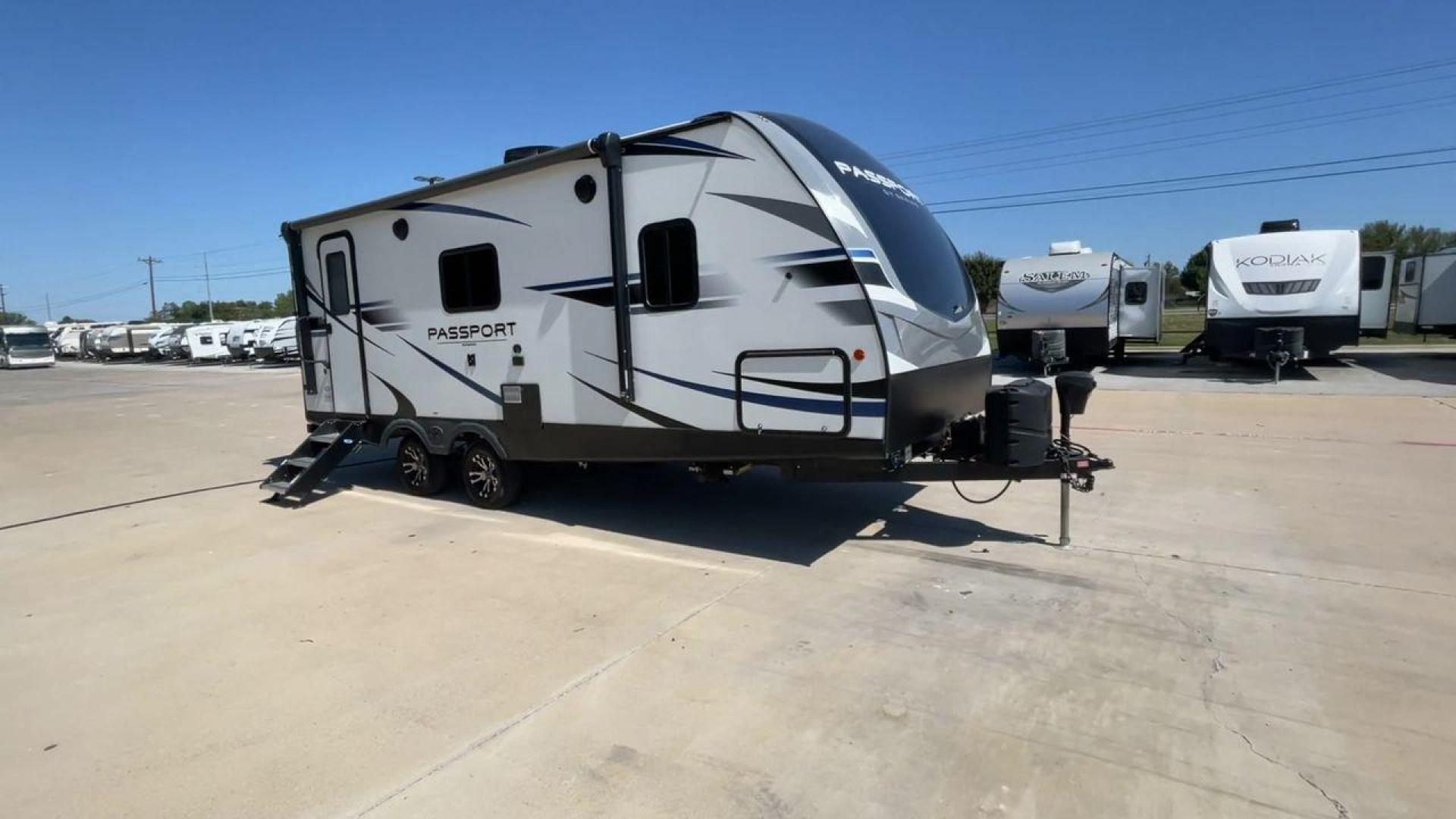 2021 KEYSTONE PASSPORT 2210RB (4YDT22126MD) , Length: 26.25 ft. | Dry Weight: 4,854 lbs. | Gross Weight: 7,000 lbs. | Slides: 1 transmission, located at 4319 N Main Street, Cleburne, TX, 76033, (817) 221-0660, 32.435829, -97.384178 - The 2021 Keystone Passport 2210RB is an ideal lightweight travel trailer. It is specially made for those seeking comfort and convenience on the road. At 26.25 feet long, it offers a compact yet spacious interior. Its dry weight is 4,854 lbs, and its gross weight is 7,000 lbs. The single slide-out en - Photo#3