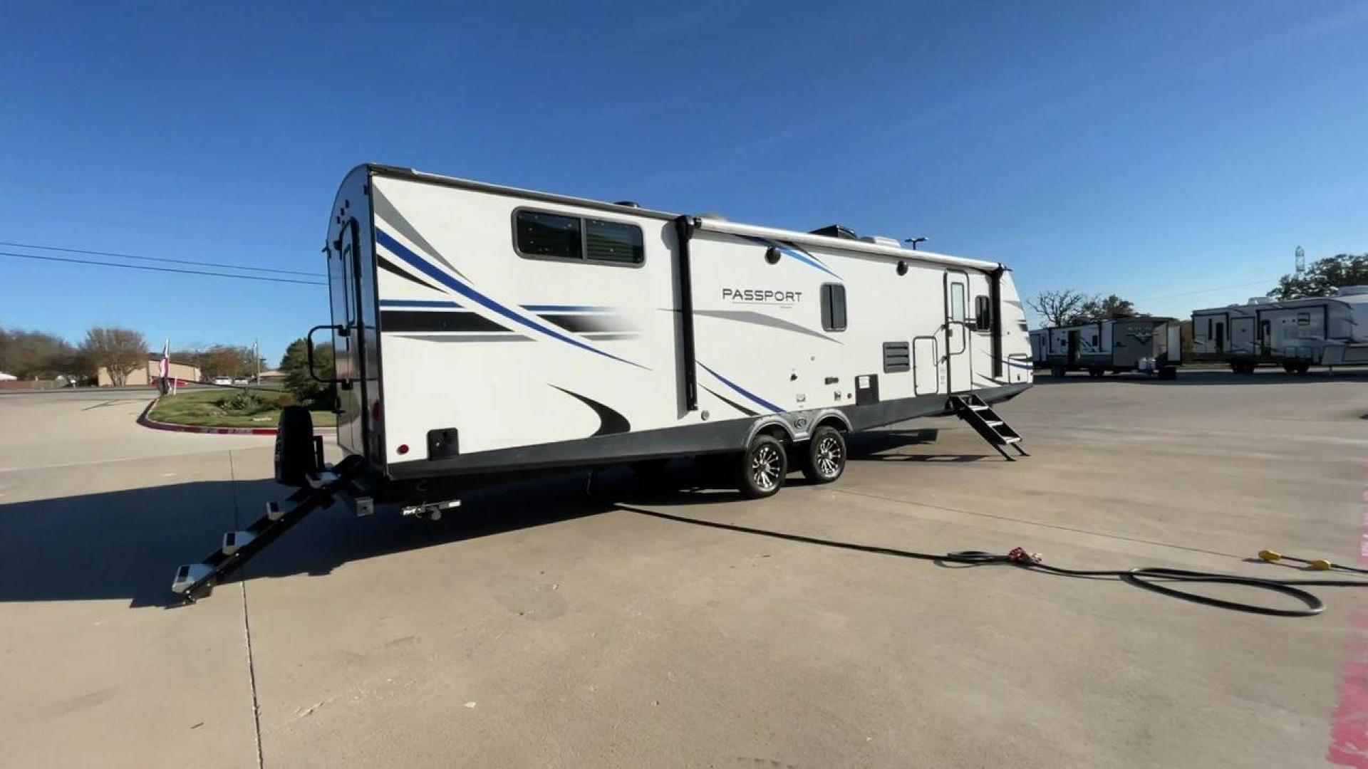 2021 KEYSTONE PASSPORT 3400QD (4YDT34020MK) , Length: 38.33 ft | Dry Weight: 7,525 lbs. | Gross Weight: 9,640 lbs | Slides: 2 transmission, located at 4319 N Main Street, Cleburne, TX, 76033, (817) 221-0660, 32.435829, -97.384178 - Discover the ultimate in camping luxury with the 2021 Keystone Passport 3400QD. This travel trailer is expertly crafted to provide you with unparalleled comfort, innovative features, and spacious living areas. This model is perfect for those who value spaciousness and easy towing. With a length of 3 - Photo#1