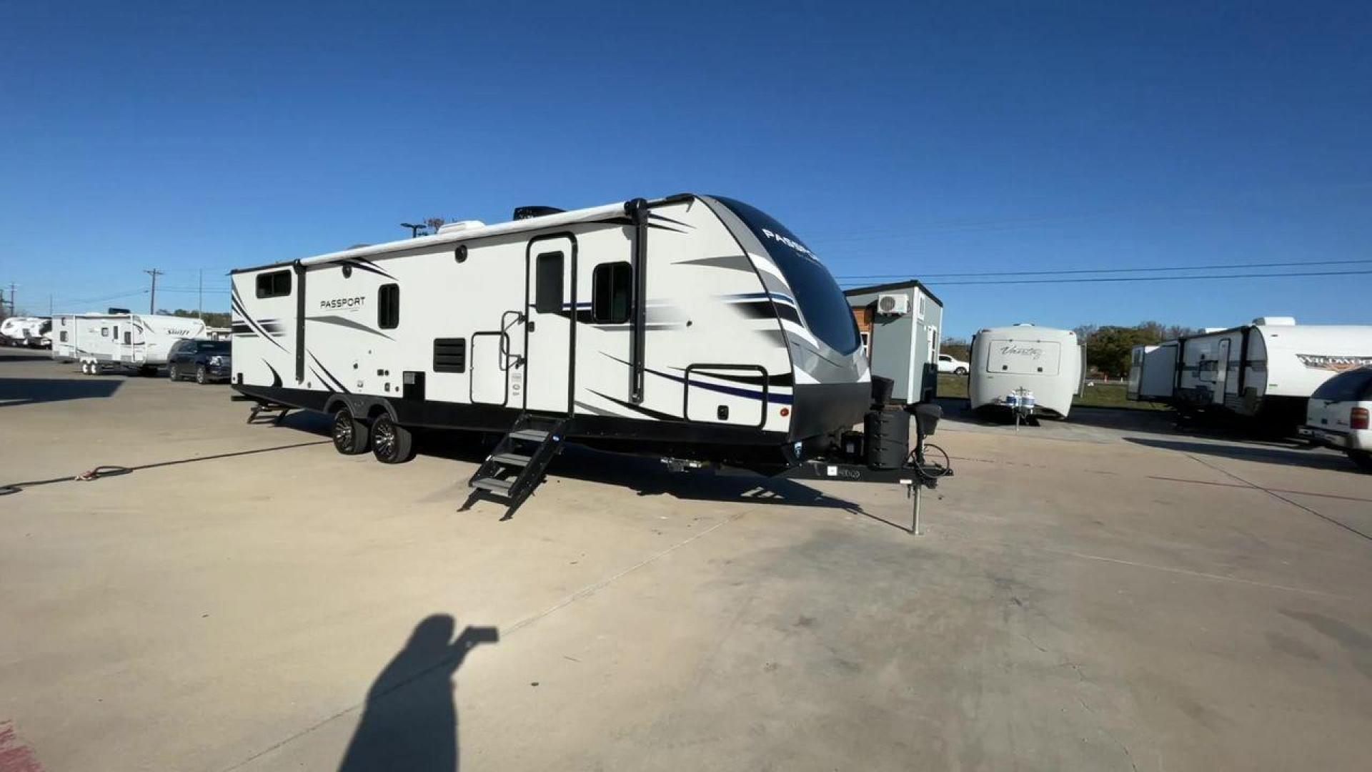 2021 KEYSTONE PASSPORT 3400QD (4YDT34020MK) , Length: 38.33 ft | Dry Weight: 7,525 lbs. | Gross Weight: 9,640 lbs | Slides: 2 transmission, located at 4319 N Main Street, Cleburne, TX, 76033, (817) 221-0660, 32.435829, -97.384178 - Discover the ultimate in camping luxury with the 2021 Keystone Passport 3400QD. This travel trailer is expertly crafted to provide you with unparalleled comfort, innovative features, and spacious living areas. This model is perfect for those who value spaciousness and easy towing. With a length of 3 - Photo#3