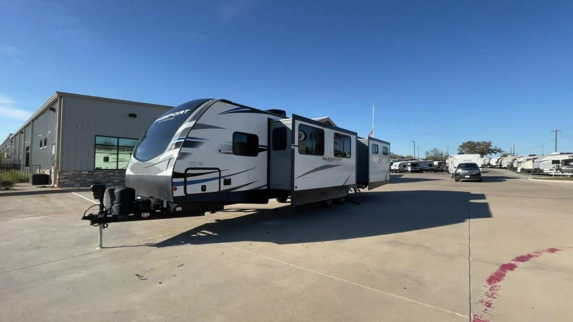 2021 KEYSTONE PASSPORT 3400QD (4YDT34020MK) , Length: 38.33 ft | Dry Weight: 7,525 lbs. | Gross Weight: 9,640 lbs | Slides: 2 transmission, located at 4319 N Main Street, Cleburne, TX, 76033, (817) 221-0660, 32.435829, -97.384178 - Discover the ultimate in camping luxury with the 2021 Keystone Passport 3400QD. This travel trailer is expertly crafted to provide you with unparalleled comfort, innovative features, and spacious living areas. This model is perfect for those who value spaciousness and easy towing. With a length of 3 - Photo#5