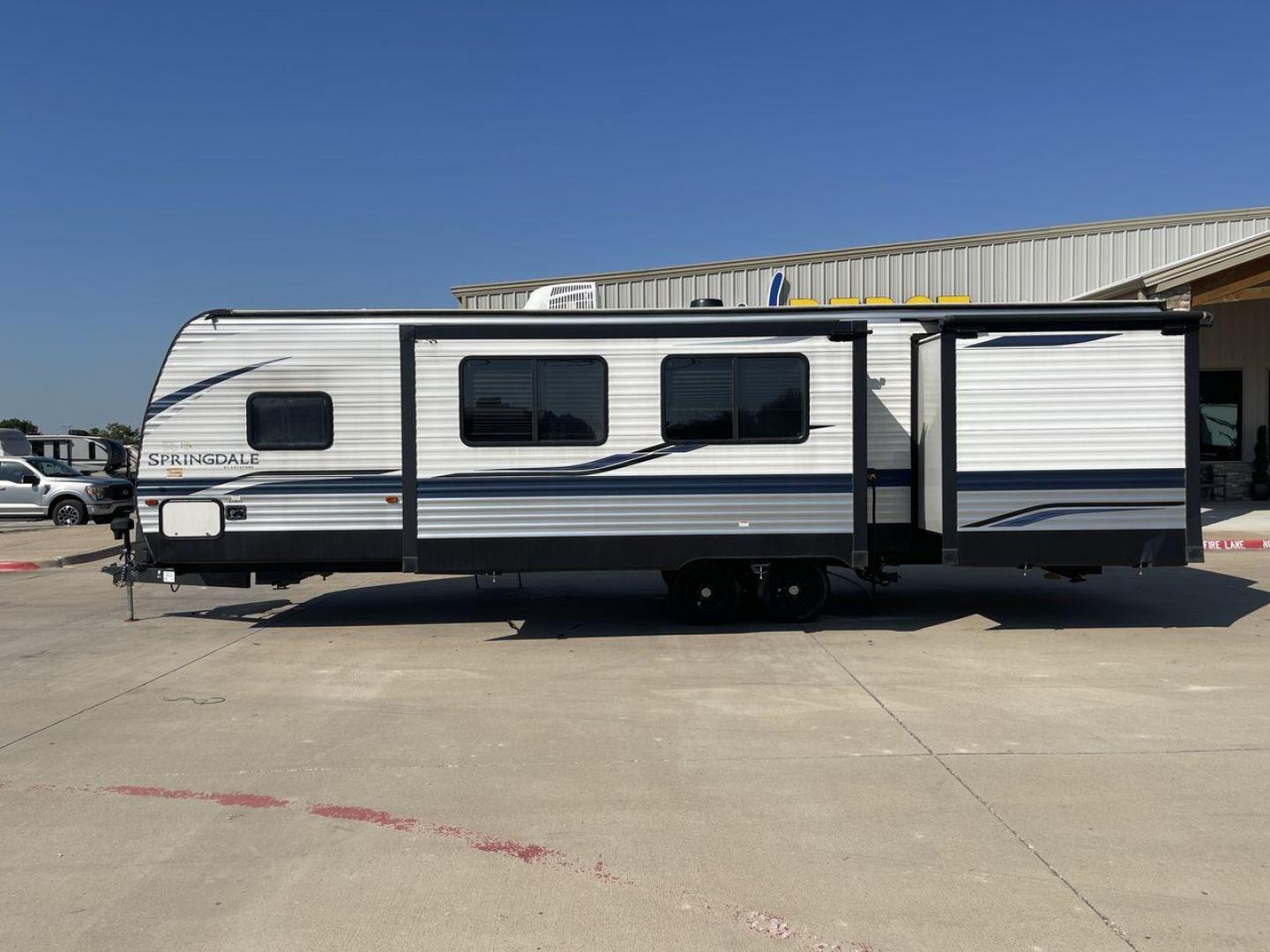 2021 KEYSTONE SPRINGDALE 301TR (4YDT30129M3) , Length: 35 ft. | Dry Weight: 7,915 lbs. | Gross Weight: 9,660 lbs. | Slides: 2 transmission, located at 4319 N Main Street, Cleburne, TX, 76033, (817) 221-0660, 32.435829, -97.384178 - The 2021 Keystone Springdale 301TR is a 35-foot travel trailer that offers a blend of comfort, style, and functionality. Weighing in at a dry weight of 7,915 lbs. and a gross weight of 9,660 lbs., this spacious RV features two slide-outs, which greatly enhance the interior living space. The exterior - Photo#24