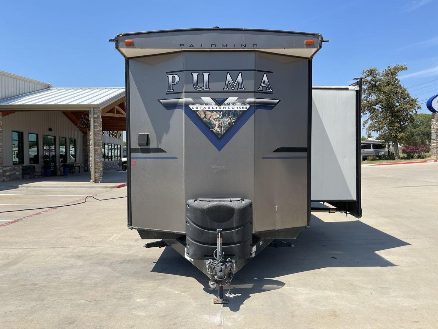 2021 TAN PUMA 39PQB - (4X4TPUR25MP) , located at 4319 N Main Street, Cleburne, TX, 76033, (817) 221-0660, 32.435829, -97.384178 - This Puma Travel Trailer measures just over 42 feet long and 8 feet wide with a dry weight of 10,709 lbs. It has a GVWR of 13,413 lbs and a hitch weight of 1,413 lbs. This unit comes with automatic heating and cooling rated at 35,000 and 13,500 BTUs respectively. The exterior of this unit is a base - Photo#22