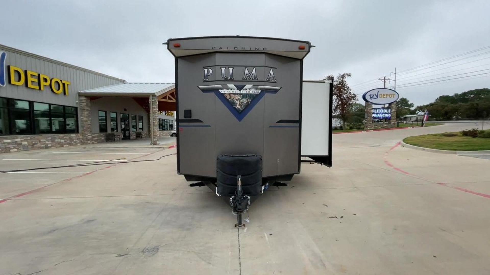 2021 TAN PUMA 39PQB - (4X4TPUR25MP) , located at 4319 N Main Street, Cleburne, TX, 76033, (817) 221-0660, 32.435829, -97.384178 - This Puma Travel Trailer measures just over 42 feet long and 8 feet wide with a dry weight of 10,709 lbs. It has a GVWR of 13,413 lbs and a hitch weight of 1,413 lbs. This unit comes with automatic heating and cooling rated at 35,000 and 13,500 BTUs respectively. The exterior of this unit is a base - Photo#4