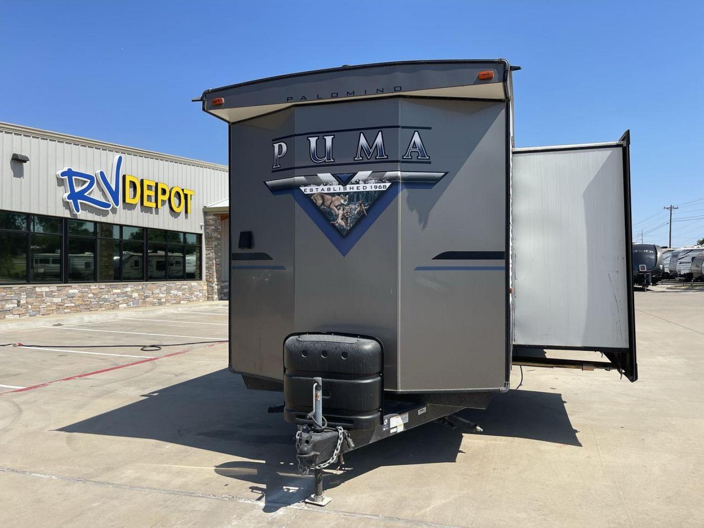 2021 PUMA 39PQB - (4X4TPUR23MP) , located at 4319 N Main Street, Cleburne, TX, 76033, (817) 221-0660, 32.435829, -97.384178 - This Puma Travel Trailer measures just over 42 feet long and 8 feet wide with a dry weight of 10,709 lbs. It has a GVWR of 13,413 lbs and a hitch weight of 1,413 lbs. This unit comes with automatic heating and cooling rated at 35,000 and 13,500 BTUs respectively. The exterior of this unit is a base - Photo#0