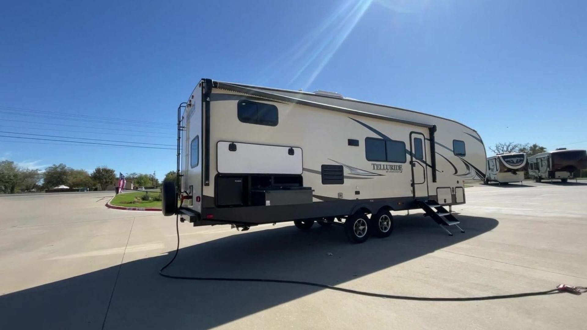 2021 STARCRAFT TELLURIDE 297BHS (1SACS0BS6M3) , Slides: 2 transmission, located at 4319 N Main Street, Cleburne, TX, 76033, (817) 221-0660, 32.435829, -97.384178 - Discover the ultimate blend of luxury and adaptability with the 2021 Starcraft Telluride 297BHS. This fifth wheel comes with two slideouts and a spacious 21-foot power awning, providing plenty of room for outdoor relaxation and entertainment. Designed to comfortably accommodate up to 10 people, this - Photo#1