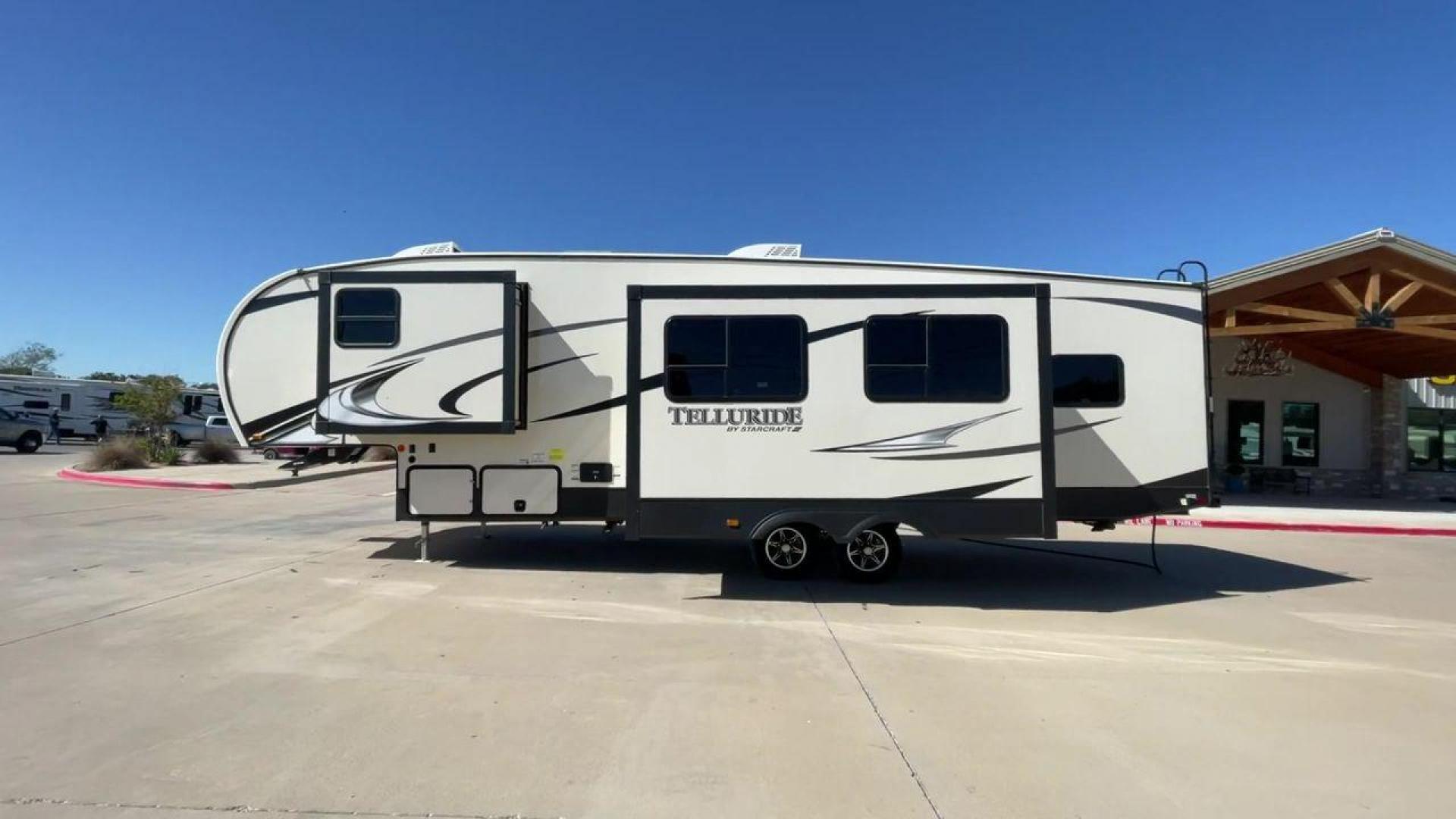 2021 STARCRAFT TELLURIDE 297BHS (1SACS0BS6M3) , Slides: 2 transmission, located at 4319 N Main Street, Cleburne, TX, 76033, (817) 221-0660, 32.435829, -97.384178 - Discover the ultimate blend of luxury and adaptability with the 2021 Starcraft Telluride 297BHS. This fifth wheel comes with two slideouts and a spacious 21-foot power awning, providing plenty of room for outdoor relaxation and entertainment. Designed to comfortably accommodate up to 10 people, this - Photo#6