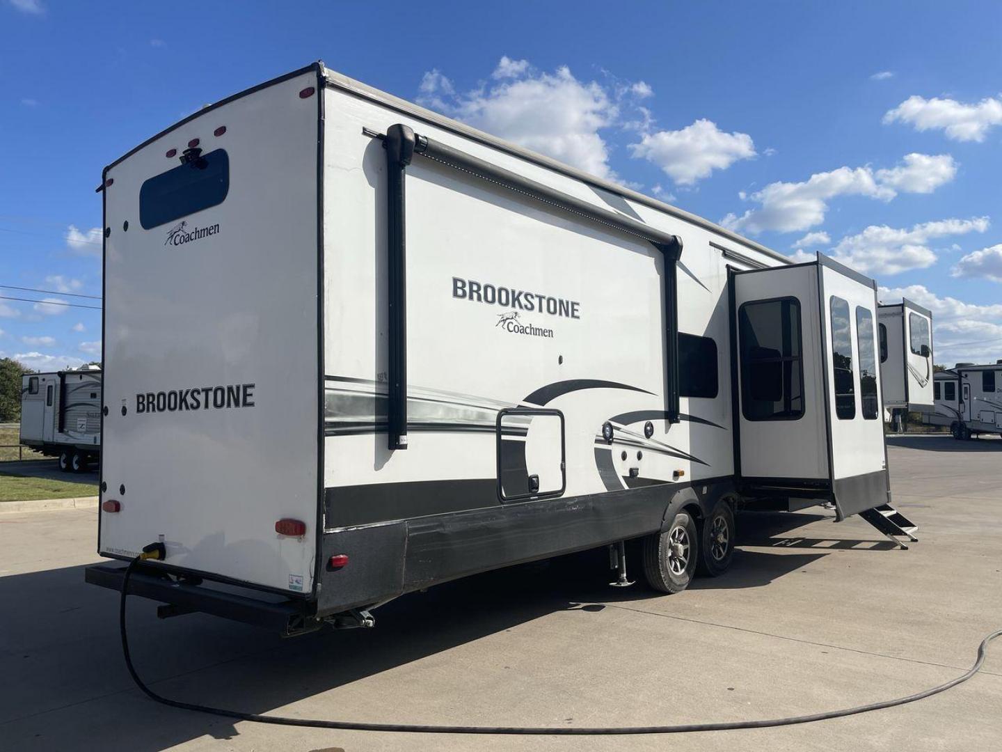 2022 FOREST RIVER BROOKSTONE 344FL (5ZT3BKZB1NA) , Length: 42 ft | Dry Weight: 12,789 lbs. | Gross Weight: 15,000 lbs. | Slides: 5 transmission, located at 4319 N Main Street, Cleburne, TX, 76033, (817) 221-0660, 32.435829, -97.384178 - Boasting a spacious and well-designed floor plan, this model stands out for numerous reasons. The Brookstone 344FL is equipped with top-notch amenities, including a fully-equipped kitchen with stainless steel appliances and solid surface countertops. Its four slide-outs ensure maximum interior space - Photo#24