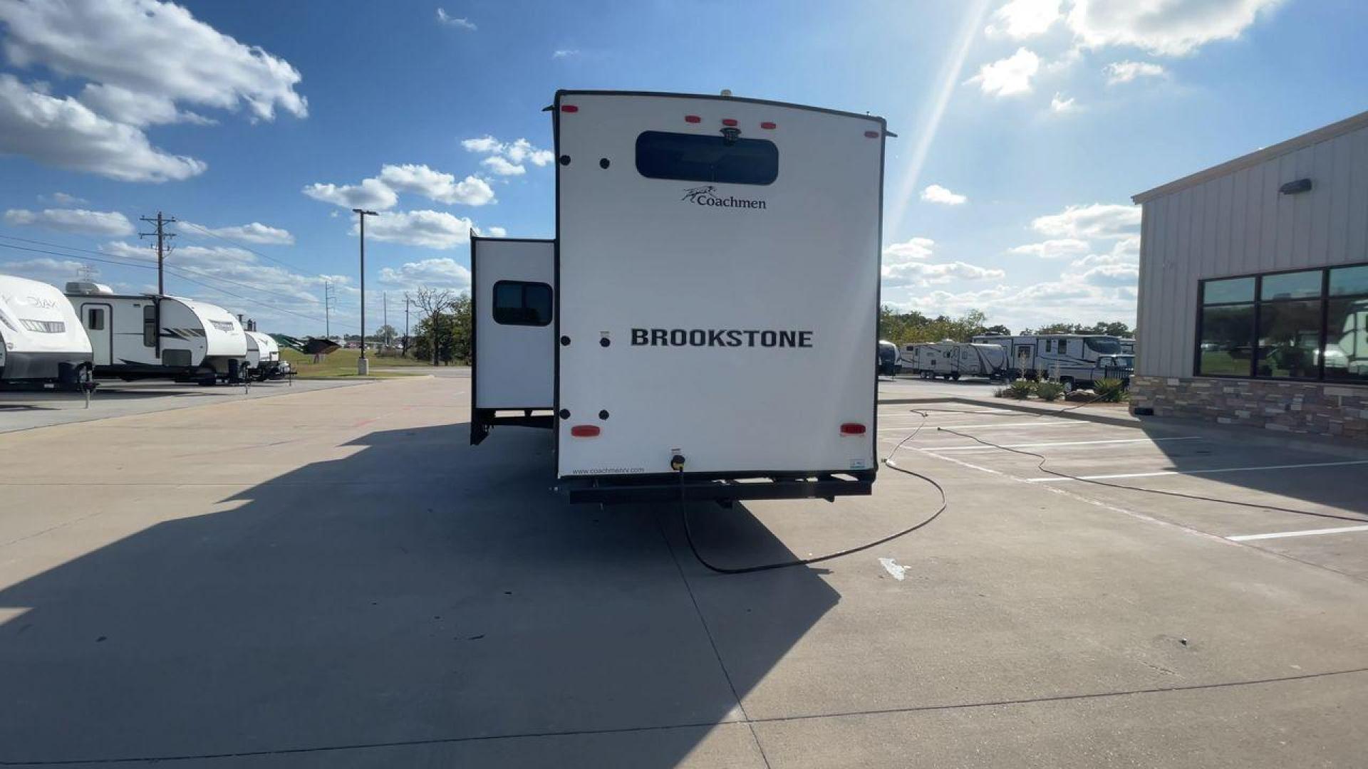 2022 FOREST RIVER BROOKSTONE 344FL (5ZT3BKZB1NA) , Length: 42 ft | Dry Weight: 12,789 lbs. | Gross Weight: 15,000 lbs. | Slides: 5 transmission, located at 4319 N Main Street, Cleburne, TX, 76033, (817) 221-0660, 32.435829, -97.384178 - Boasting a spacious and well-designed floor plan, this model stands out for numerous reasons. The Brookstone 344FL is equipped with top-notch amenities, including a fully-equipped kitchen with stainless steel appliances and solid surface countertops. Its four slide-outs ensure maximum interior space - Photo#8