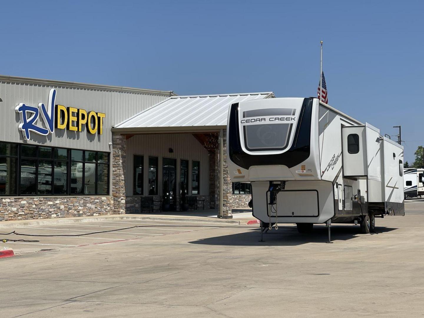 2022 FOREST RIVER CEDAR CREEK 388WDM (4X4FCRR23NS) , Length: 41.5 ft. | Dry Weight: 13,085 lbs. | Slides: 3 transmission, located at 4319 N Main Street, Cleburne, TX, 76033, (817) 221-0660, 32.435829, -97.384178 - Photo#0