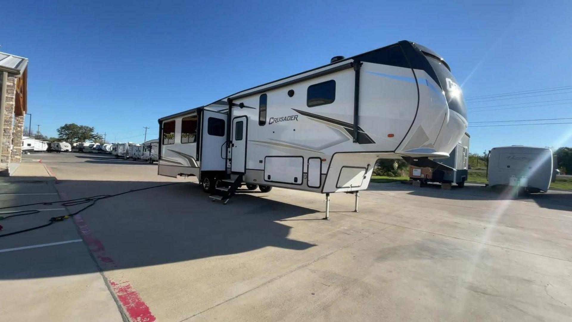 2022 FOREST RIVER CRUSADER 335RLP (5ZT3CSZBXNG) , Length: 37 ft | Dry Weight: 11,114 lbs | Slides: 3 transmission, located at 4319 N Main Street, Cleburne, TX, 76033, (817) 221-0660, 32.435829, -97.384178 - The 2022 Forest River Crusader 335RLP is an exceptional fifth wheel that offers a perfect blend of luxury, convenience, and spacious living. Measuring at a length of 37 feet and with a dry weight of 11,114 lbs, this model provides a well-balanced towing experience while ensuring a generous and comfo - Photo#3