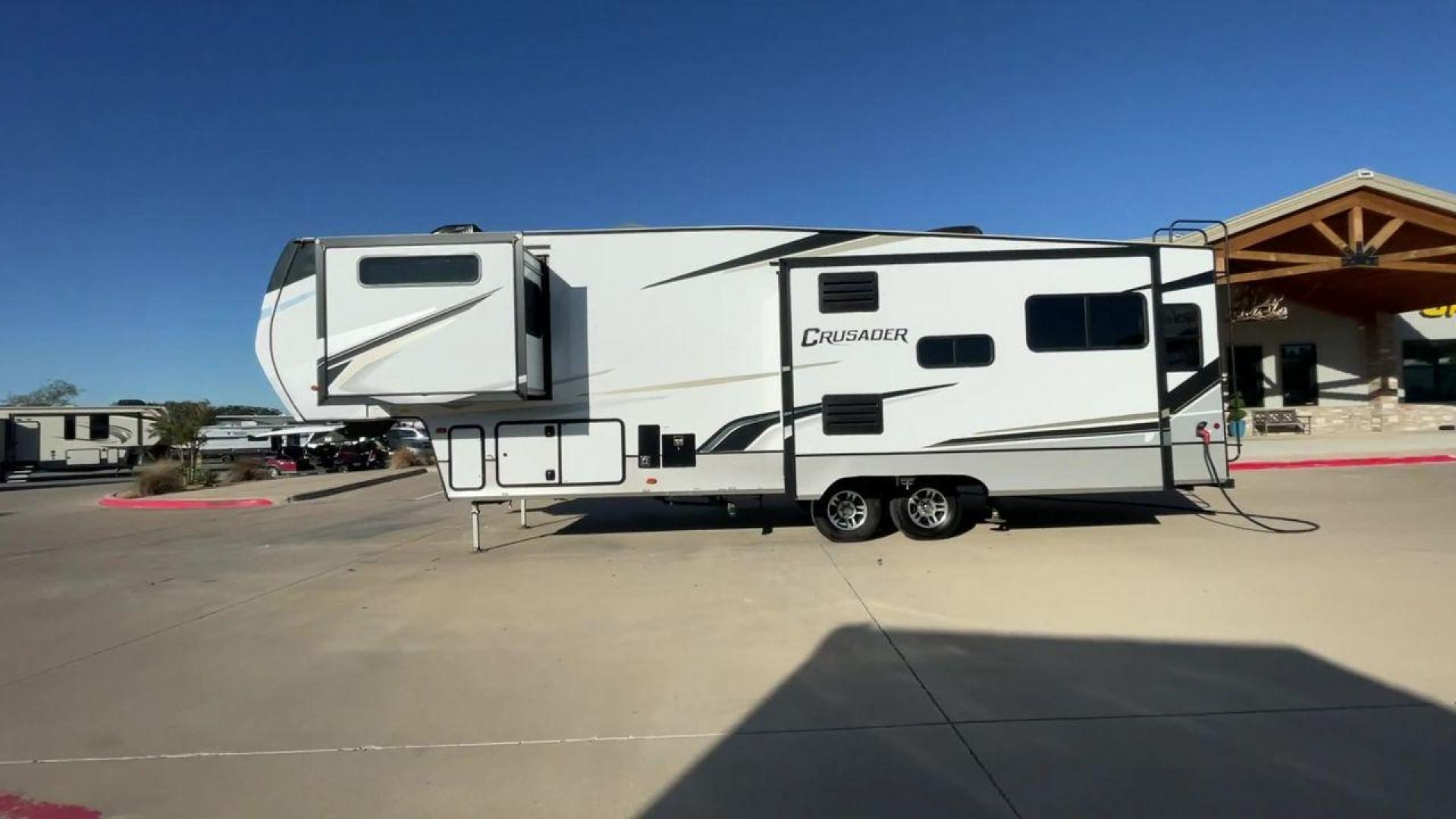 2022 FOREST RIVER CRUSADER 335RLP (5ZT3CSZBXNG) , Length: 37 ft | Dry Weight: 11,114 lbs | Slides: 3 transmission, located at 4319 N Main Street, Cleburne, TX, 76033, (817) 221-0660, 32.435829, -97.384178 - The 2022 Forest River Crusader 335RLP is an exceptional fifth wheel that offers a perfect blend of luxury, convenience, and spacious living. Measuring at a length of 37 feet and with a dry weight of 11,114 lbs, this model provides a well-balanced towing experience while ensuring a generous and comfo - Photo#6