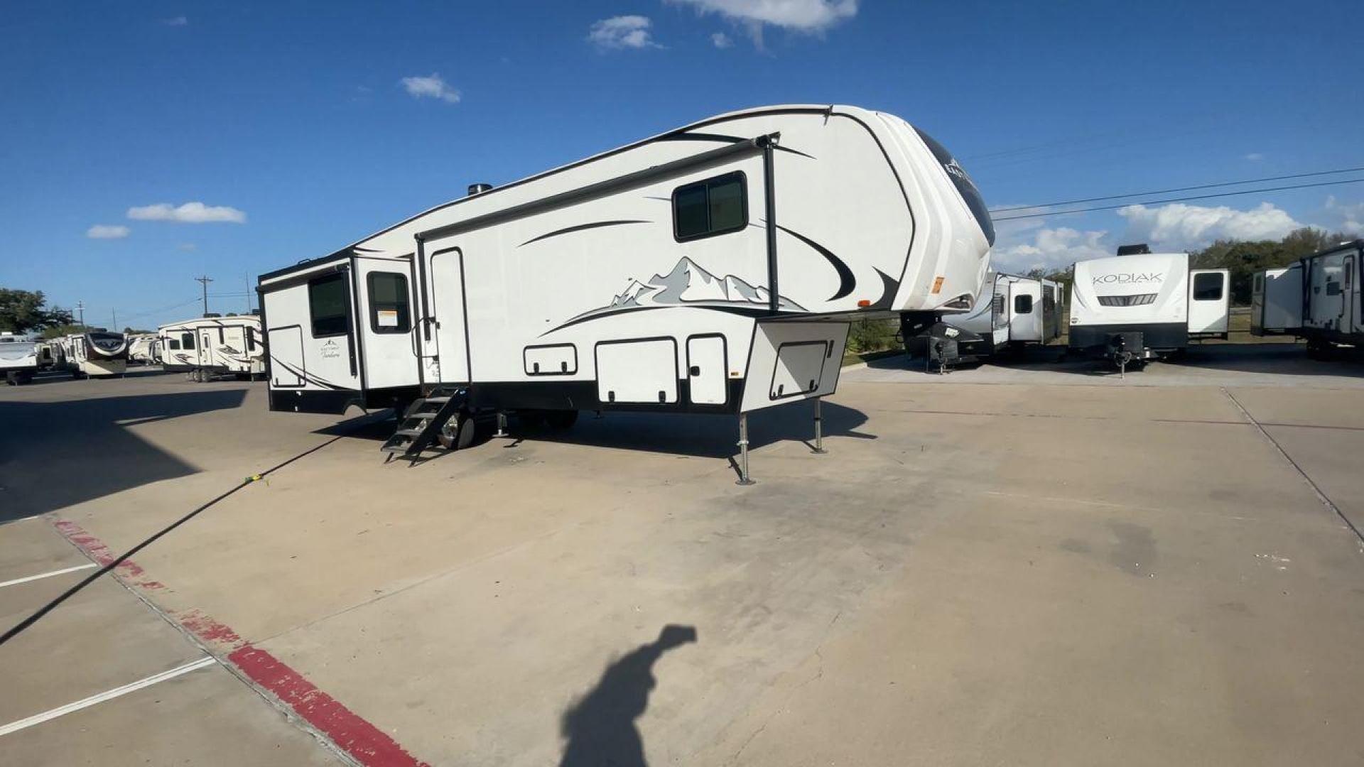 2022 FOREST RIVER EAST TO WEST TANDARA (5ZT3TD4B6N9) , Length: 41.25 ft | Dry Weight: 13,179 lbs | Slides: 4 transmission, located at 4319 N Main Street, Cleburne, TX, 76033, (817) 221-0660, 32.435829, -97.384178 - At 41.25 ft. long, the front cap showcases a bold "East to West Tandara" logo, accentuated by clean, aerodynamic curves. Large, tinted windows provide natural light while maintaining privacy. Four (4) slideouts expand the living space, enhancing functionality when parked. The trailer is equipped wit - Photo#3