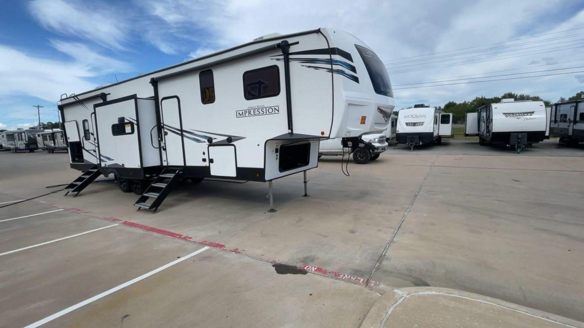 2022 FOREST RIVER IMPRESSION 330BH (5ZT3MPYB4ND) , Length: 41 ft. | Dry Weight: 10,433 lbs. | Gross Weight: 14,165 lbs. | Slides: 3 transmission, located at 4319 N Main Street, Cleburne, TX, 76033, (817) 221-0660, 32.435829, -97.384178 - Photo#3