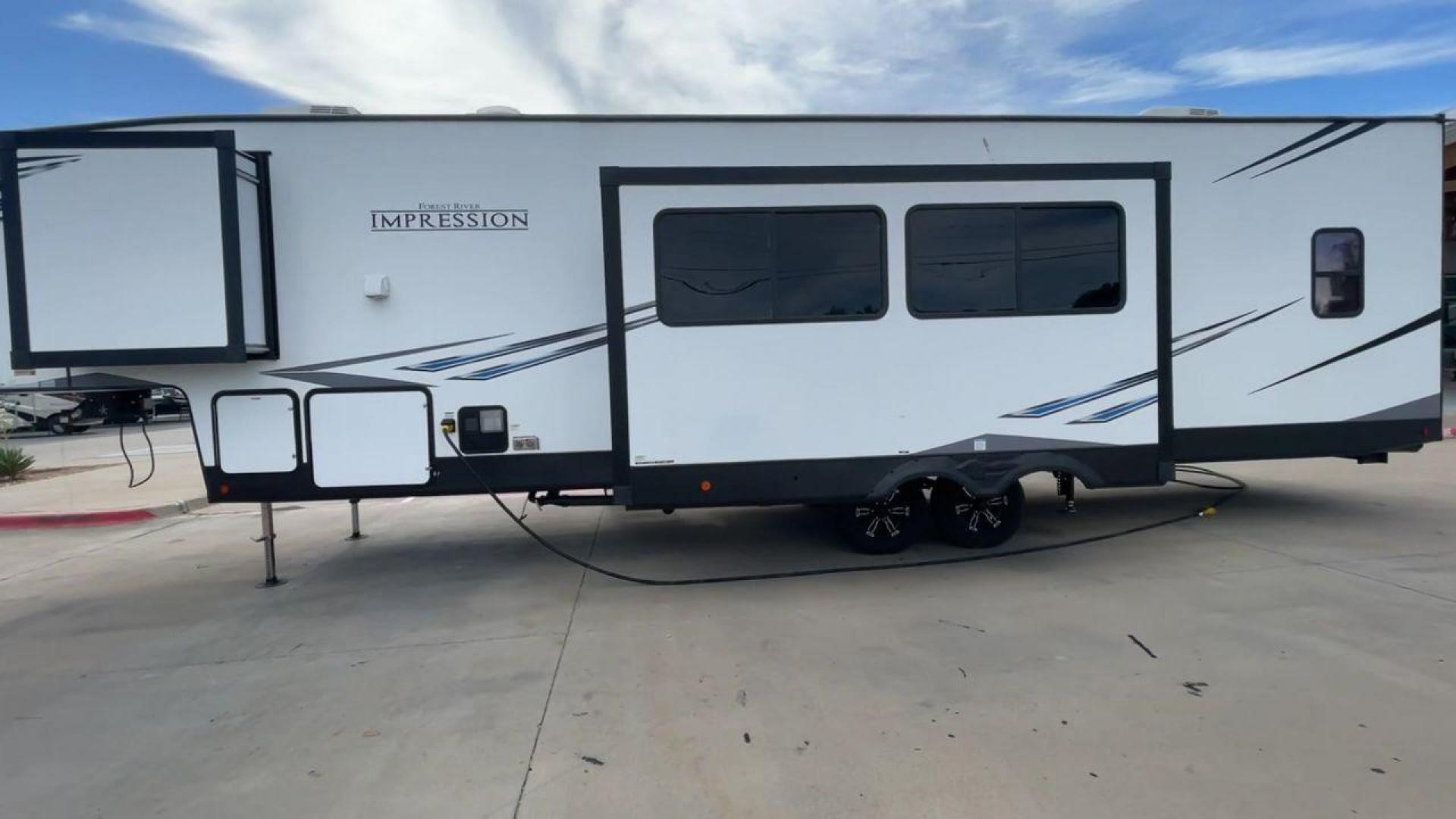 2022 FOREST RIVER IMPRESSION 330BH (5ZT3MPYB4ND) , Length: 41 ft. | Dry Weight: 10,433 lbs. | Gross Weight: 14,165 lbs. | Slides: 3 transmission, located at 4319 N Main Street, Cleburne, TX, 76033, (817) 221-0660, 32.435829, -97.384178 - Photo#6