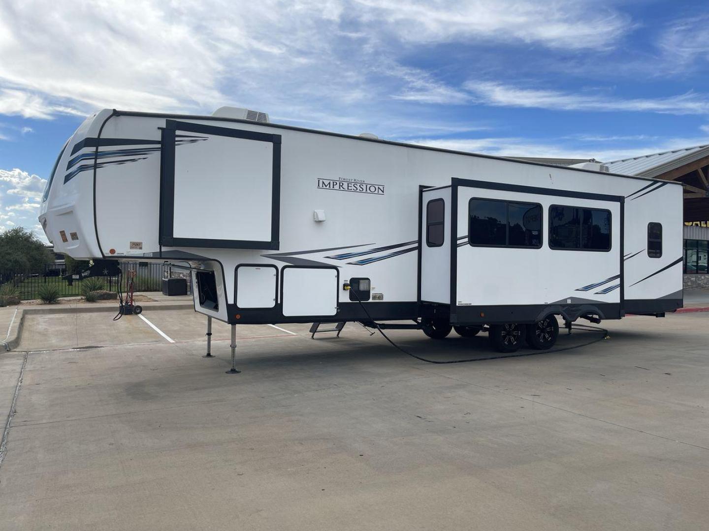 2022 FOREST RIVER IMPRESSION 330BH (5ZT3MPYB4ND) , Length: 41 ft. | Dry Weight: 10,433 lbs. | Gross Weight: 14,165 lbs. | Slides: 3 transmission, located at 4319 N Main Street, Cleburne, TX, 76033, (817) 221-0660, 32.435829, -97.384178 - Photo#24