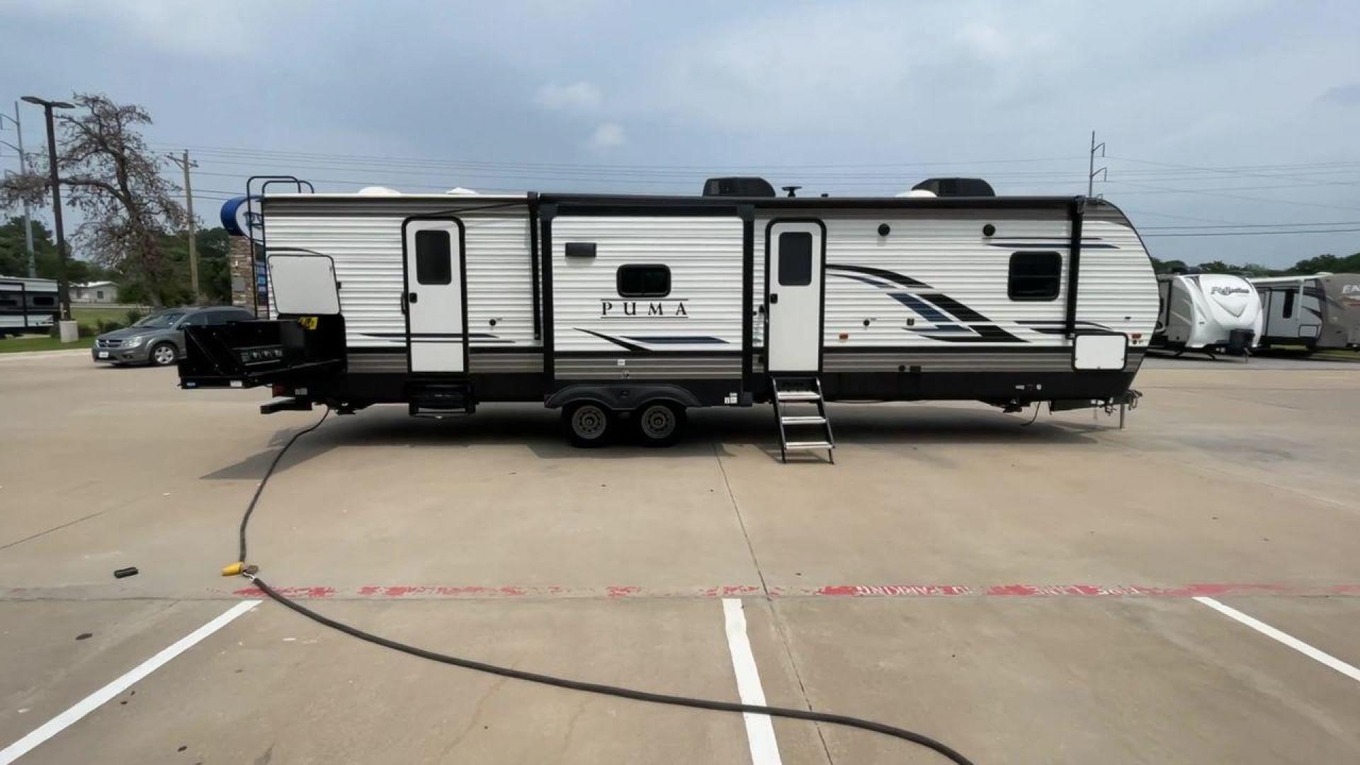 2022 FOREST RIVER PUMA 32BH2B (4X4TPUH22NP) , Length: 38.5 ft. | Dry Weight: 9,023 lbs. | Gross Weight: 11,230 lbs. | Slides: 3 transmission, located at 4319 N Main Street, Cleburne, TX, 76033, (817) 221-0660, 32.435829, -97.384178 - Photo#2