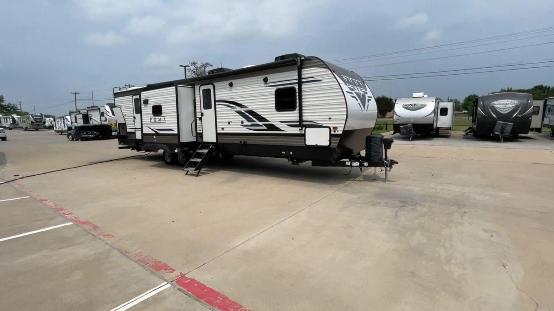 2022 FOREST RIVER PUMA 32BH2B (4X4TPUH22NP) , Length: 38.5 ft. | Dry Weight: 9,023 lbs. | Gross Weight: 11,230 lbs. | Slides: 3 transmission, located at 4319 N Main Street, Cleburne, TX, 76033, (817) 221-0660, 32.435829, -97.384178 - Photo#3