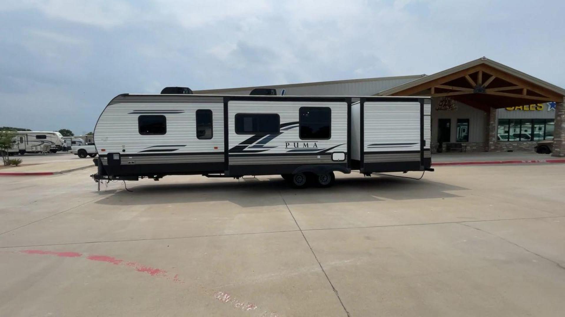 2022 FOREST RIVER PUMA 32BH2B (4X4TPUH22NP) , Length: 38.5 ft. | Dry Weight: 9,023 lbs. | Gross Weight: 11,230 lbs. | Slides: 3 transmission, located at 4319 N Main Street, Cleburne, TX, 76033, (817) 221-0660, 32.435829, -97.384178 - Photo#6