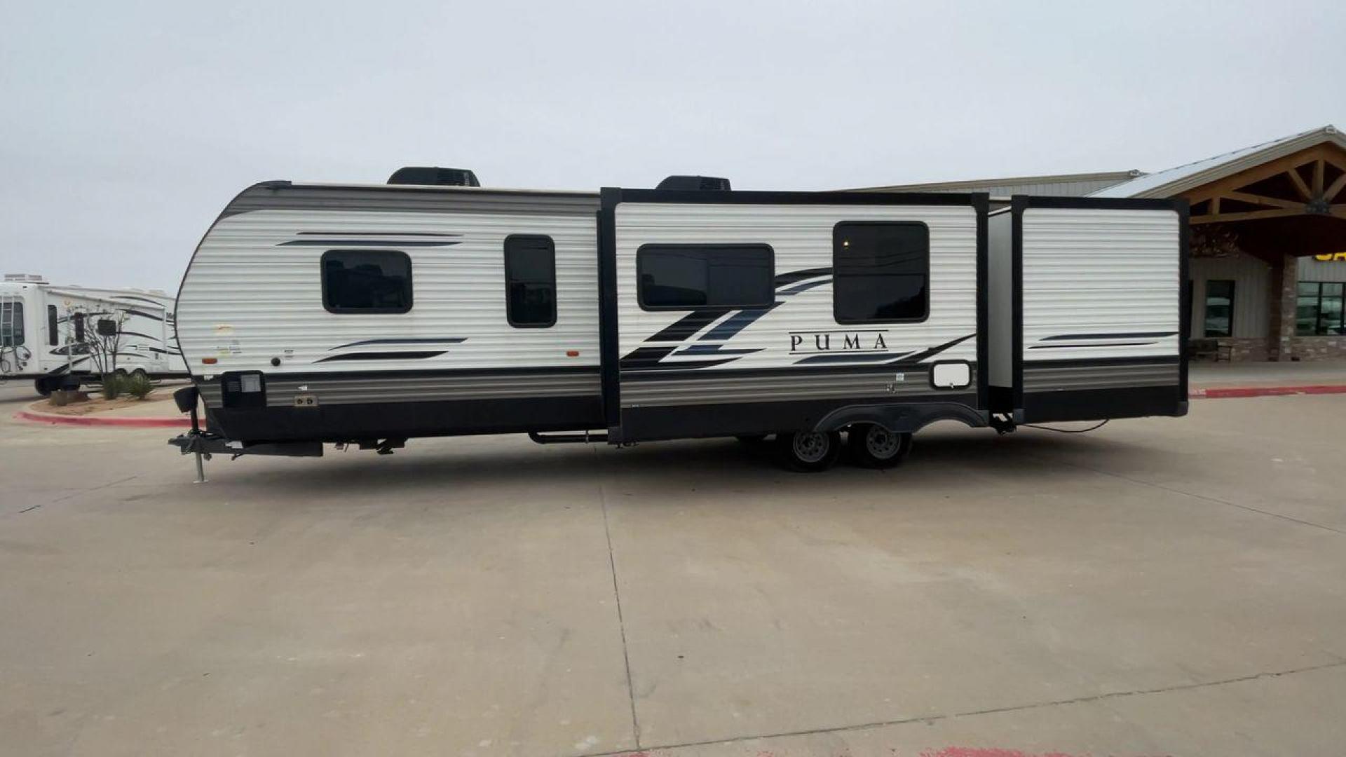 2022 FOREST RIVER PUMA 32BH2B (4X4TPUH25NP) , Length: 38.5 ft. | Dry Weight: 9,023 lbs. | Gross Weight: 11,230 lbs. | Slides: 3 transmission, located at 4319 N Main Street, Cleburne, TX, 76033, (817) 221-0660, 32.435829, -97.384178 - Photo#6