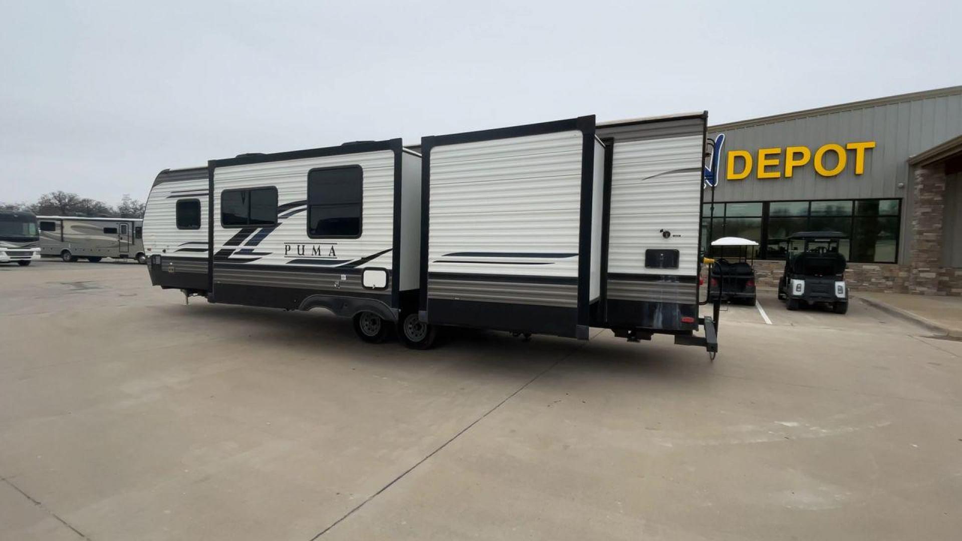 2022 FOREST RIVER PUMA 32BH2B (4X4TPUH25NP) , Length: 38.5 ft. | Dry Weight: 9,023 lbs. | Gross Weight: 11,230 lbs. | Slides: 3 transmission, located at 4319 N Main Street, Cleburne, TX, 76033, (817) 221-0660, 32.435829, -97.384178 - Photo#7