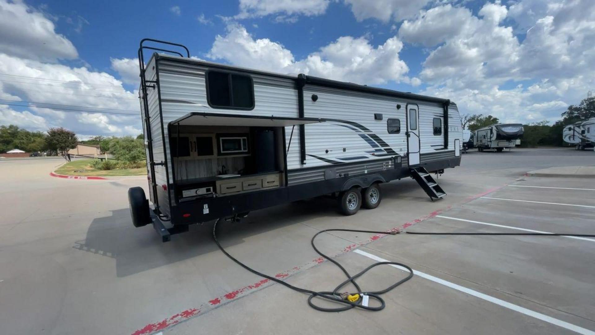 2022 FOREST RIVER PUMA 32RBFQ (4X4TPUH28NP) , Length: 36.92 ft. | Dry Weight: 8,998 lbs. | Gross Weight: 10,500 lbs. | Slides: 3 transmission, located at 4319 N Main Street, Cleburne, TX, 76033, (817) 221-0660, 32.435829, -97.384178 - Photo#1