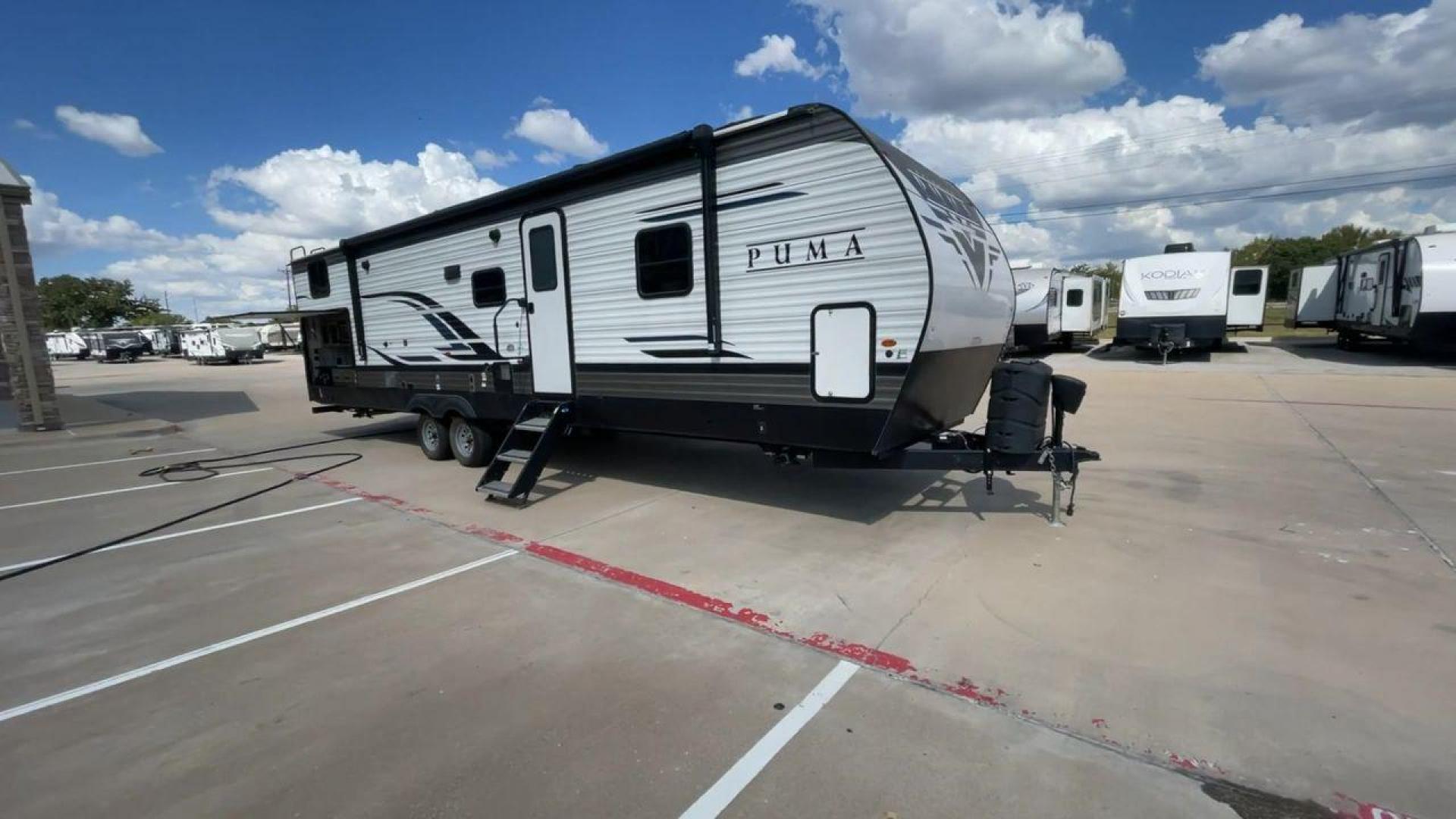 2022 FOREST RIVER PUMA 32RBFQ (4X4TPUH28NP) , Length: 36.92 ft. | Dry Weight: 8,998 lbs. | Gross Weight: 10,500 lbs. | Slides: 3 transmission, located at 4319 N Main Street, Cleburne, TX, 76033, (817) 221-0660, 32.435829, -97.384178 - Photo#3