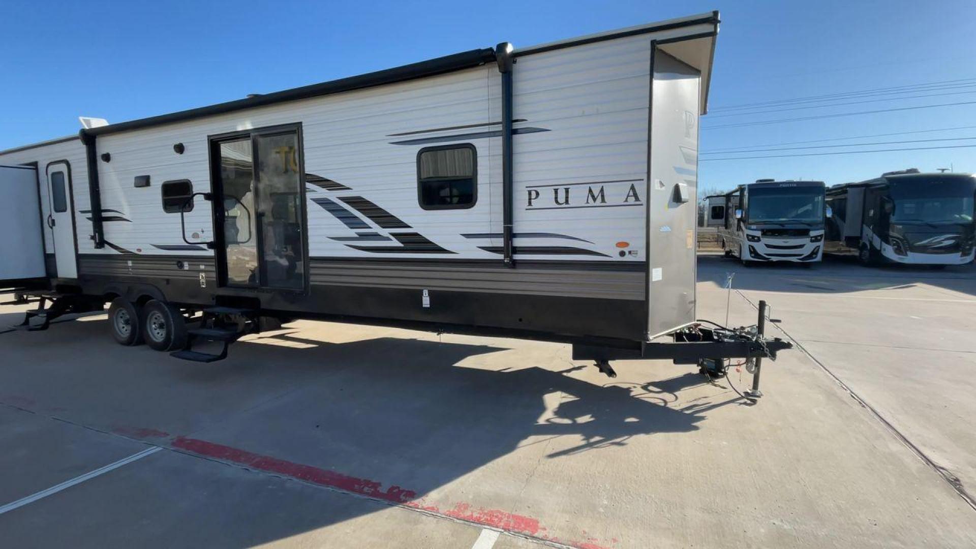 2022 FOREST RIVER PUMA 39PQB (4X4TPUR26NP) , Length: 42.25 ft. | Dry Weight: 10,709 lbs. | Gross Weight: 13,413 lbs. | Slides: 4 transmission, located at 4319 N Main Street, Cleburne, TX, 76033, (817) 221-0660, 32.435829, -97.384178 - Photo#3