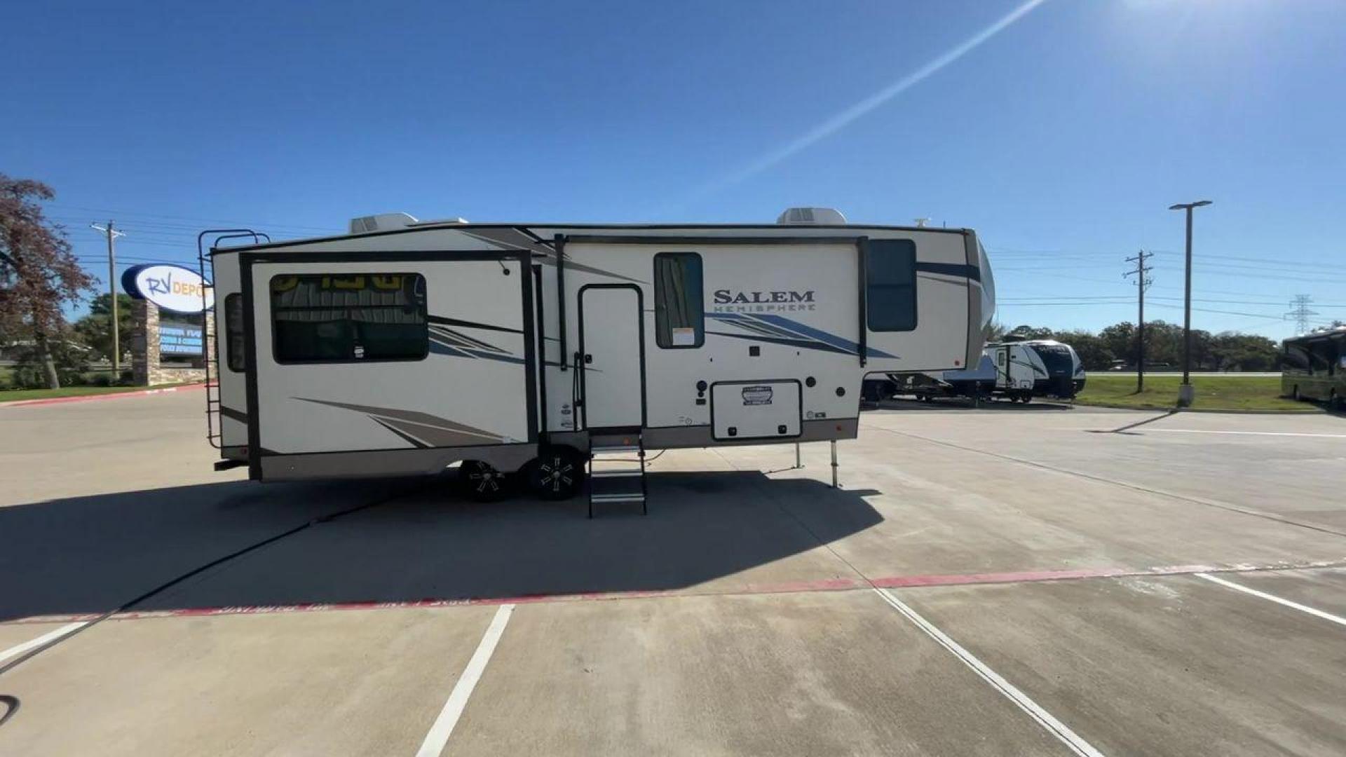 2022 FOREST RIVER SALEM HEMISPHERE 286 (4X4FSBE29NV) , Length: 33.92 ft. | Dry Weight: 9,229 lbs. | Slides: 3 transmission, located at 4319 N Main Street, Cleburne, TX, 76033, (817) 221-0660, 32.435829, -97.384178 - The 2022 Forest River Salem Hemisphere 286RL is a travel trailer that combines luxury, innovation, and comfort for an unparalleled camping experience. This travel trailer is designed for those who seek a blend of sophistication and functionality in their RVing lifestyle. The living area features plu - Photo#2