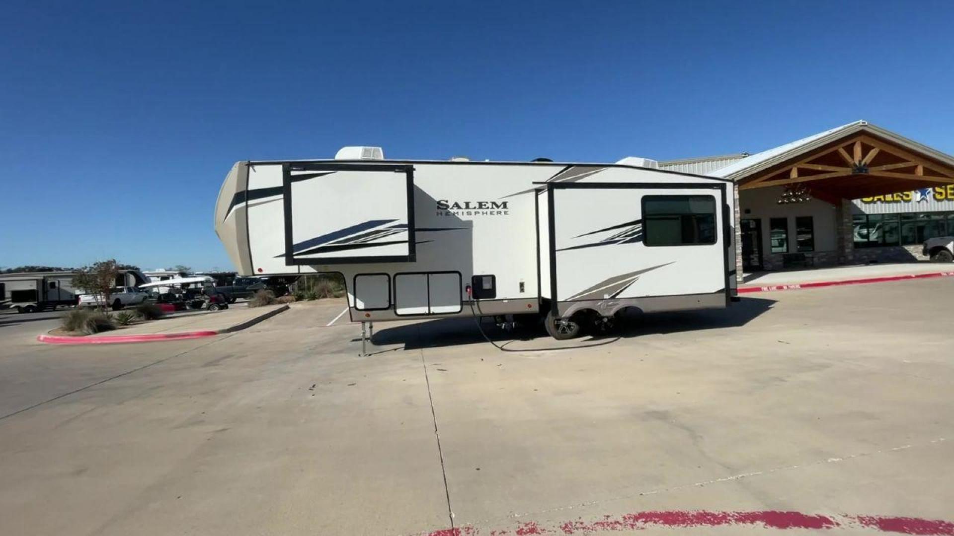 2022 FOREST RIVER SALEM HEMISPHERE 286 (4X4FSBE29NV) , Length: 33.92 ft. | Dry Weight: 9,229 lbs. | Slides: 3 transmission, located at 4319 N Main Street, Cleburne, TX, 76033, (817) 221-0660, 32.435829, -97.384178 - The 2022 Forest River Salem Hemisphere 286RL is a travel trailer that combines luxury, innovation, and comfort for an unparalleled camping experience. This travel trailer is designed for those who seek a blend of sophistication and functionality in their RVing lifestyle. The living area features plu - Photo#6