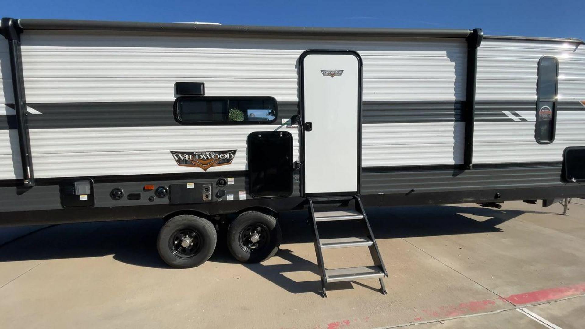 2022 FOREST RIVER WILDWOOD 29VBUD (4X4TWDE24NA) , Length: 36.17 ft. | Dry Weight: 7,728 lbs. | Slides: 1 transmission, located at 4319 N Main Street, Cleburne, TX, 76033, (817) 221-0660, 32.435829, -97.384178 - Photo#2