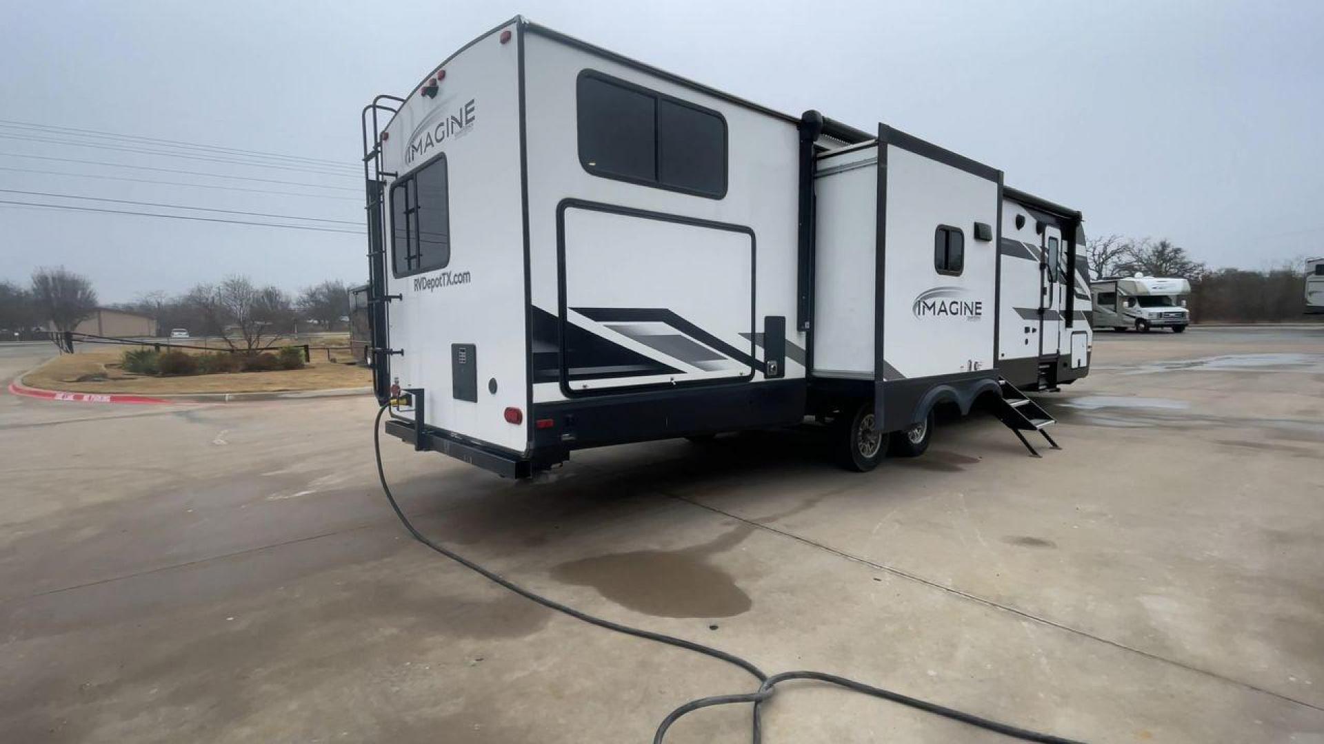 2022 GRAND DESIGN IMAGINE 3250BH (573TE372XN6) , Length: 36.92 ft. | Dry Weight: 8,496 lbs. | Gross Weight: 10,195 lbs. | Slides: 3 transmission, located at 4319 N Main Street, Cleburne, TX, 76033, (817) 221-0660, 32.435829, -97.384178 - The 2022 Grand Design Imagine 3250BH is a spacious and well-designed travel trailer perfect for family adventures. With a length of 36.92 feet, it offers plenty of living space while maintaining a manageable dry weight of 8,496 lbs. and a gross weight of 10,195 lbs. This RV is equipped with three sl - Photo#1