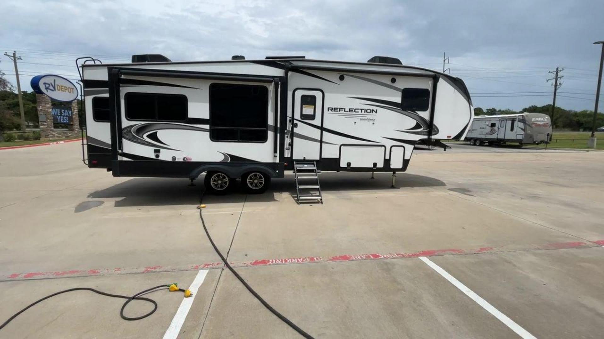 2022 GRAND DESIGN REFLECTION 303RLS (573FR342XN9) , Length: 32.75 ft. | Dry Weight: 9,694 lbs. | Gross Weight: 11,995 lbs. | Slides: 3 transmission, located at 4319 N Main Street, Cleburne, TX, 76033, (817) 221-0660, 32.435829, -97.384178 - The perfect blend of luxury and functionality is seen with the 2022 Grand Design Reflection 303RLS. This exquisite unit, measuring 32.75 feet long, is meticulously crafted to provide an exceptional living experience. With a dry weight of 9,694 lbs and a gross weight of 11,995 lbs, it is designed to - Photo#2