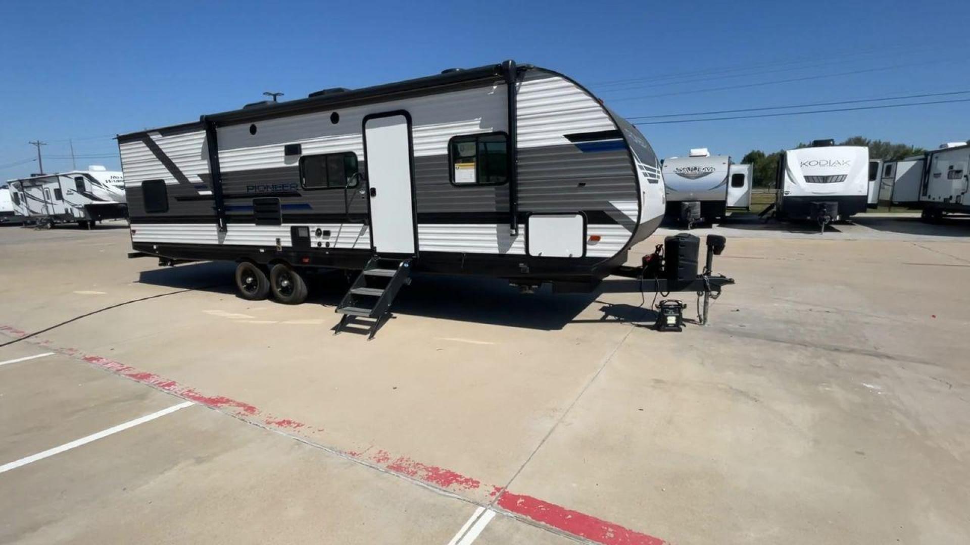 2022 HEARTLAND PIONEER QB300 (5SFPB3521NE) , Length: 35 ft. | Dry Weight: 6,896 lbs. | Gross Weight: 9,000 lbs. | Slides: 1 transmission, located at 4319 N Main Street, Cleburne, TX, 76033, (817) 221-0660, 32.435829, -97.384178 - The 2022 Heartland Pioneer QB300 is a spacious and well-equipped travel trailer, perfect for family adventures. With a length of 35 feet, this model provides ample living space while maintaining a dry weight of 6,896 lbs. and a gross weight of 9,000 lbs. It includes 1 slide-out, optimizing interior - Photo#3