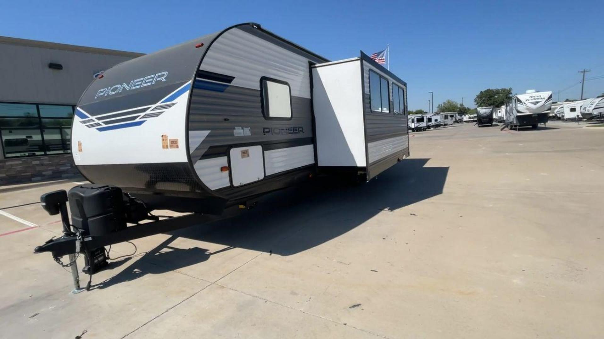 2022 HEARTLAND PIONEER QB300 (5SFPB3521NE) , Length: 35 ft. | Dry Weight: 6,896 lbs. | Gross Weight: 9,000 lbs. | Slides: 1 transmission, located at 4319 N Main Street, Cleburne, TX, 76033, (817) 221-0660, 32.435829, -97.384178 - The 2022 Heartland Pioneer QB300 is a spacious and well-equipped travel trailer, perfect for family adventures. With a length of 35 feet, this model provides ample living space while maintaining a dry weight of 6,896 lbs. and a gross weight of 9,000 lbs. It includes 1 slide-out, optimizing interior - Photo#5