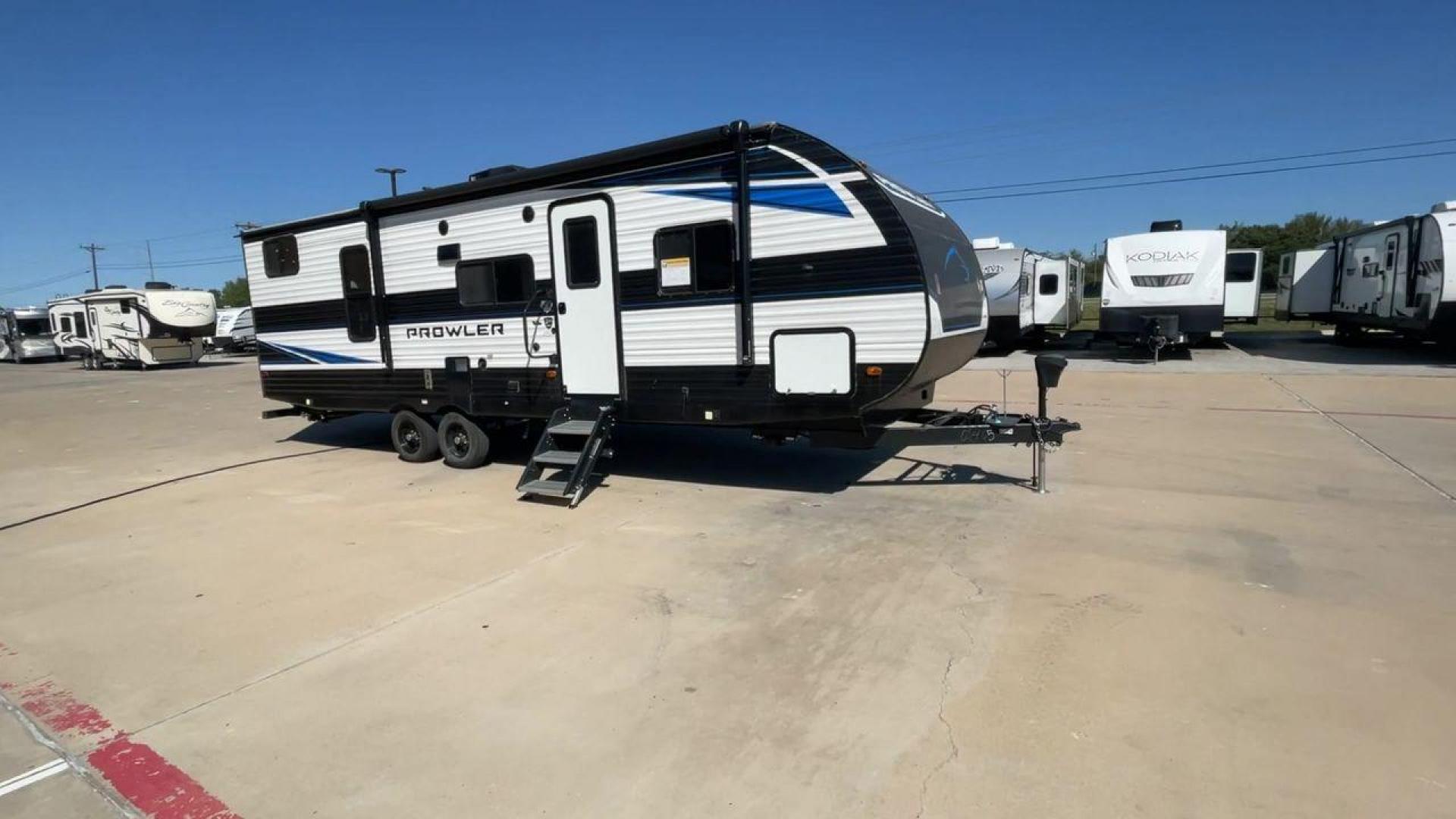 2022 HEARTLAND PROWLER 271BR (5SFPB3228NE) , Length: 31.8 ft. | Dry Weight: 6,570 lbs. | Gross Weight: 7,880 lbs. | Slides: 1 transmission, located at 4319 N Main Street, Cleburne, TX, 76033, (817) 221-0660, 32.435829, -97.384178 - The 2022 Heartland Prowler 271BR is a 31.8-foot travel trailer designed with both comfort and practicality in mind. Weighing in at a dry weight of 6,570 lbs. and a gross weight of 7,880 lbs., it strikes a balance between spaciousness and easy towing. The single slide-out enhances the interior space, - Photo#3